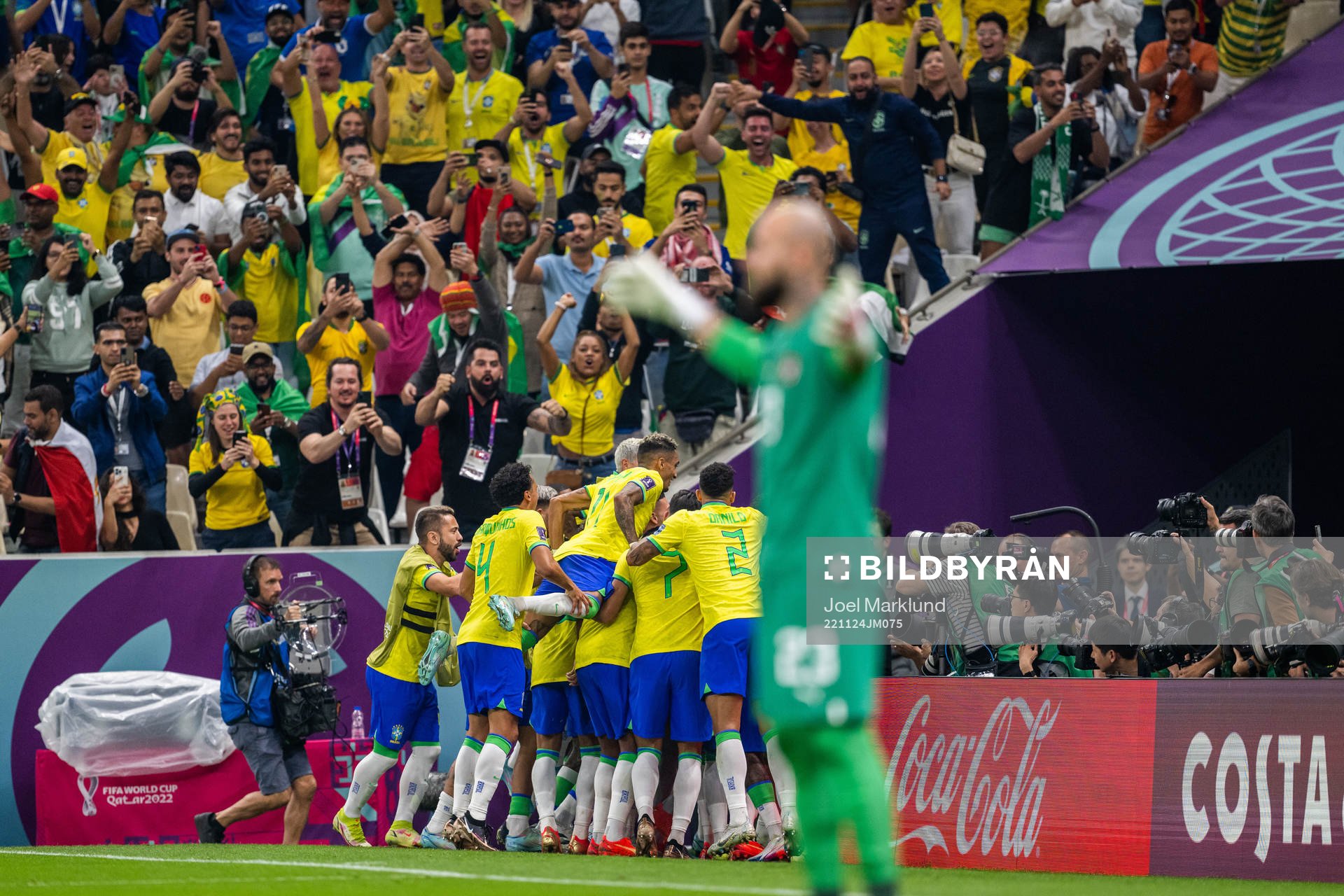 Richarlison of Brazil celebrates with team mates
