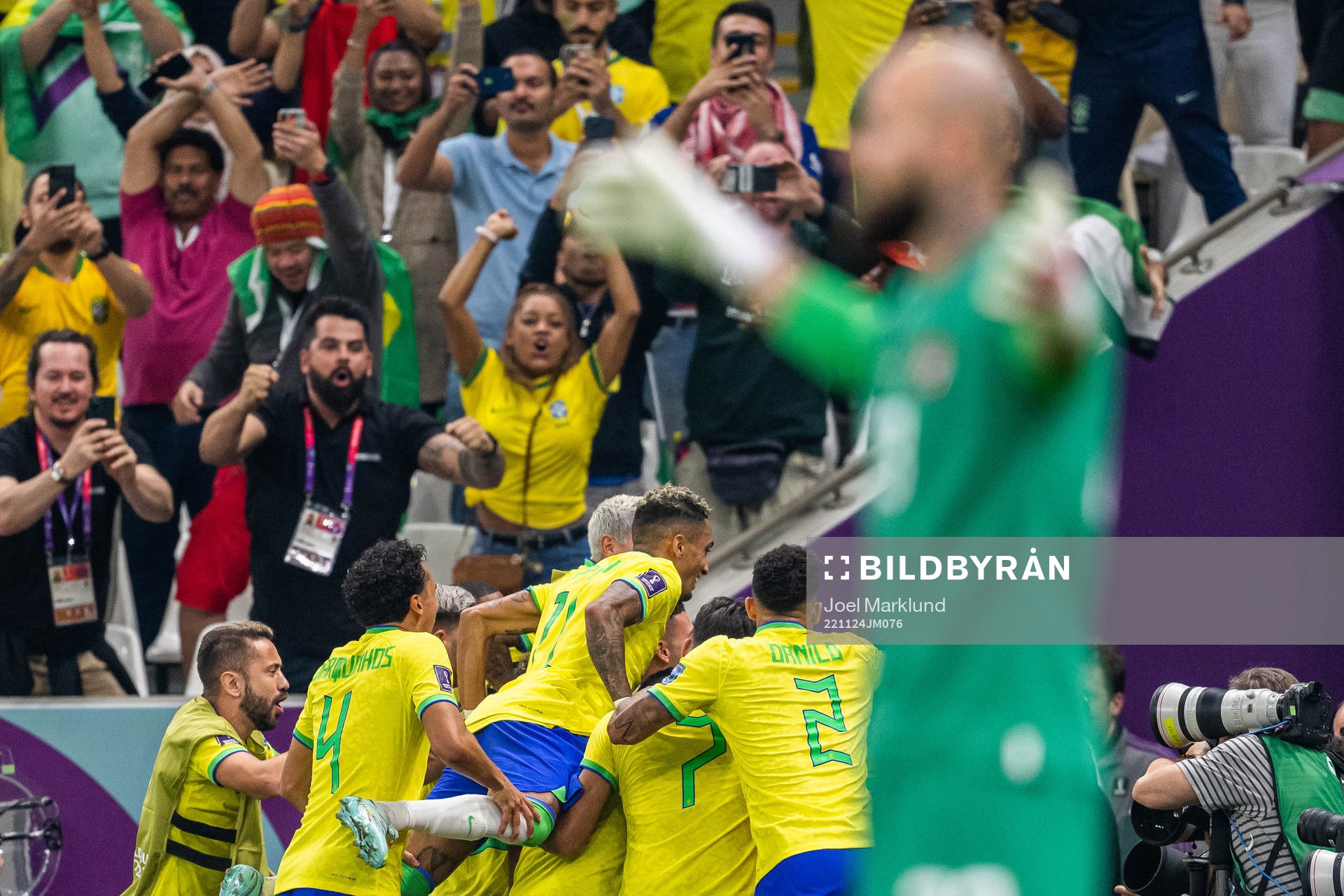 Richarlison of Brazil celebrates with team mates