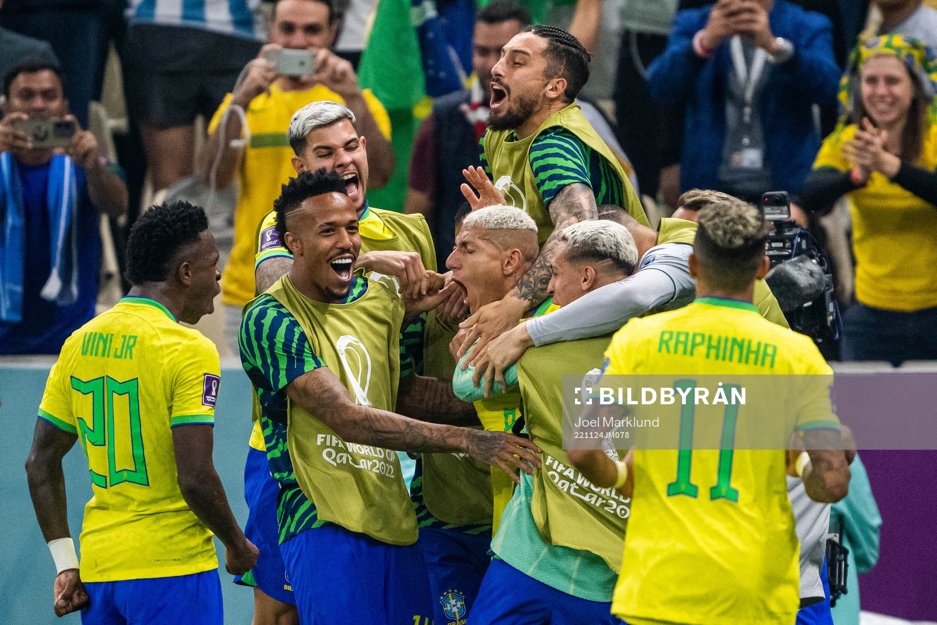 Richarlison of Brazil celebrates with team mates