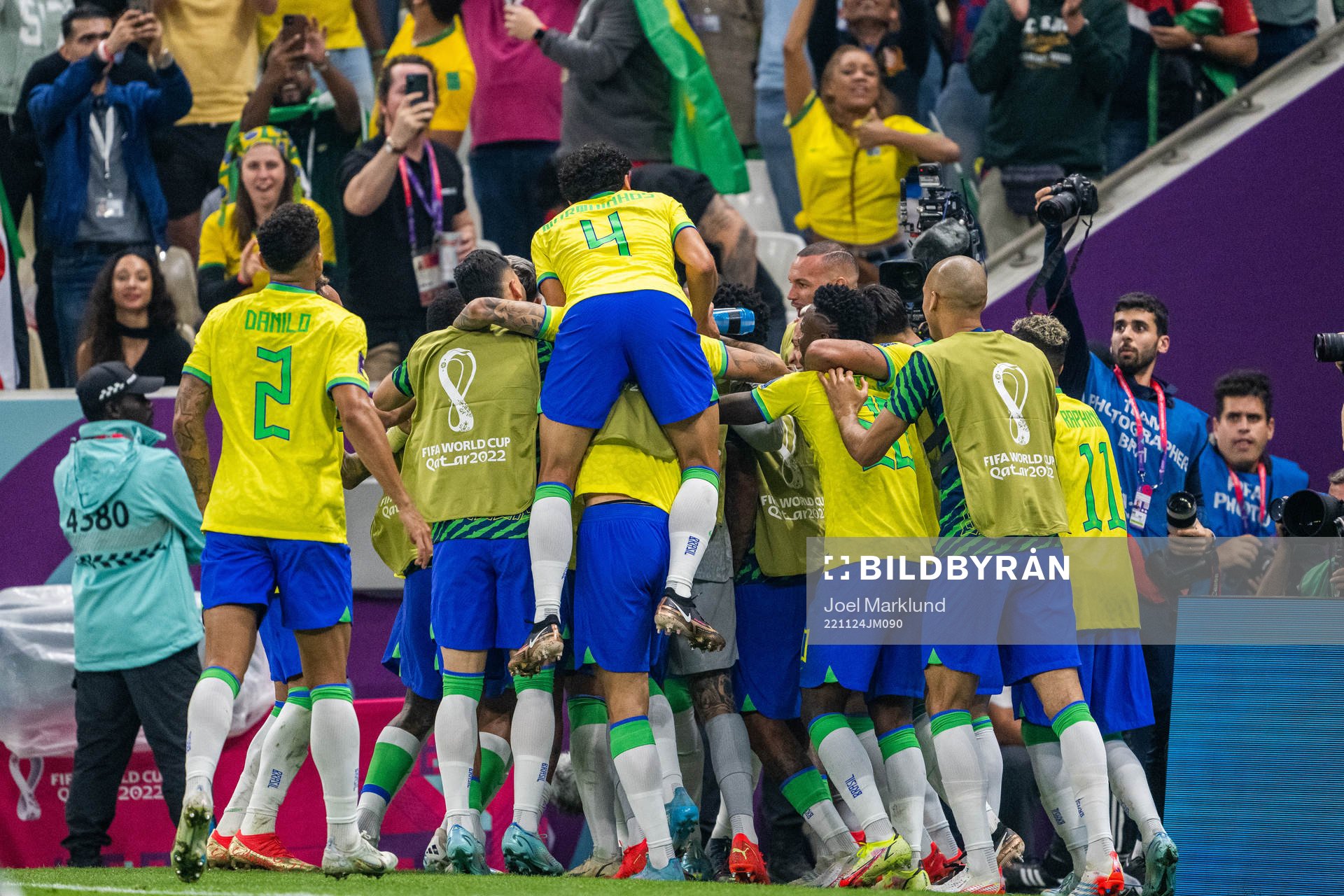 Richarlison of Brazil celebrates with team mates