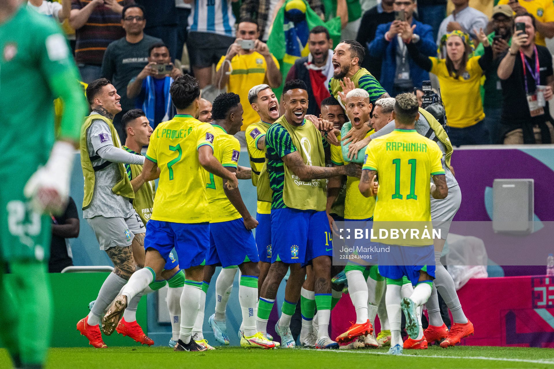 Richarlison of Brazil celebrates with team mates