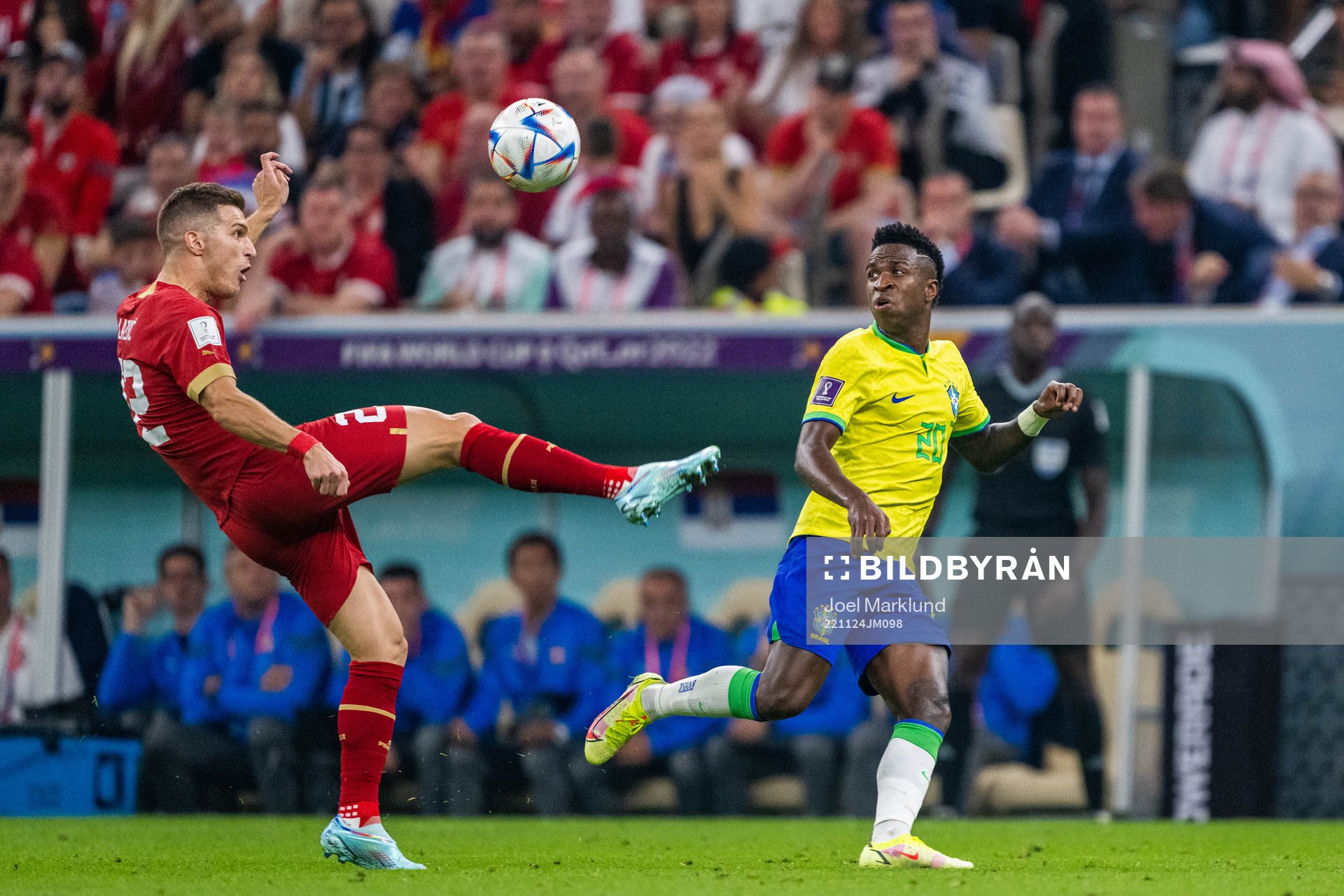 Darko Lazovic of Serbia and Vinicius Junior of Brazil