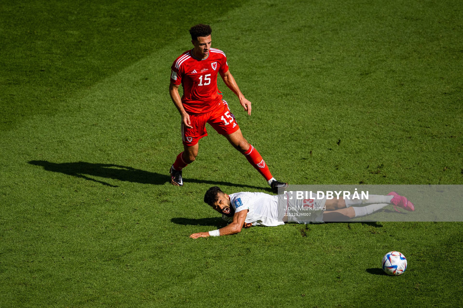 Ethan Ampadu of Wales and Ramin Rezaeian of Iran