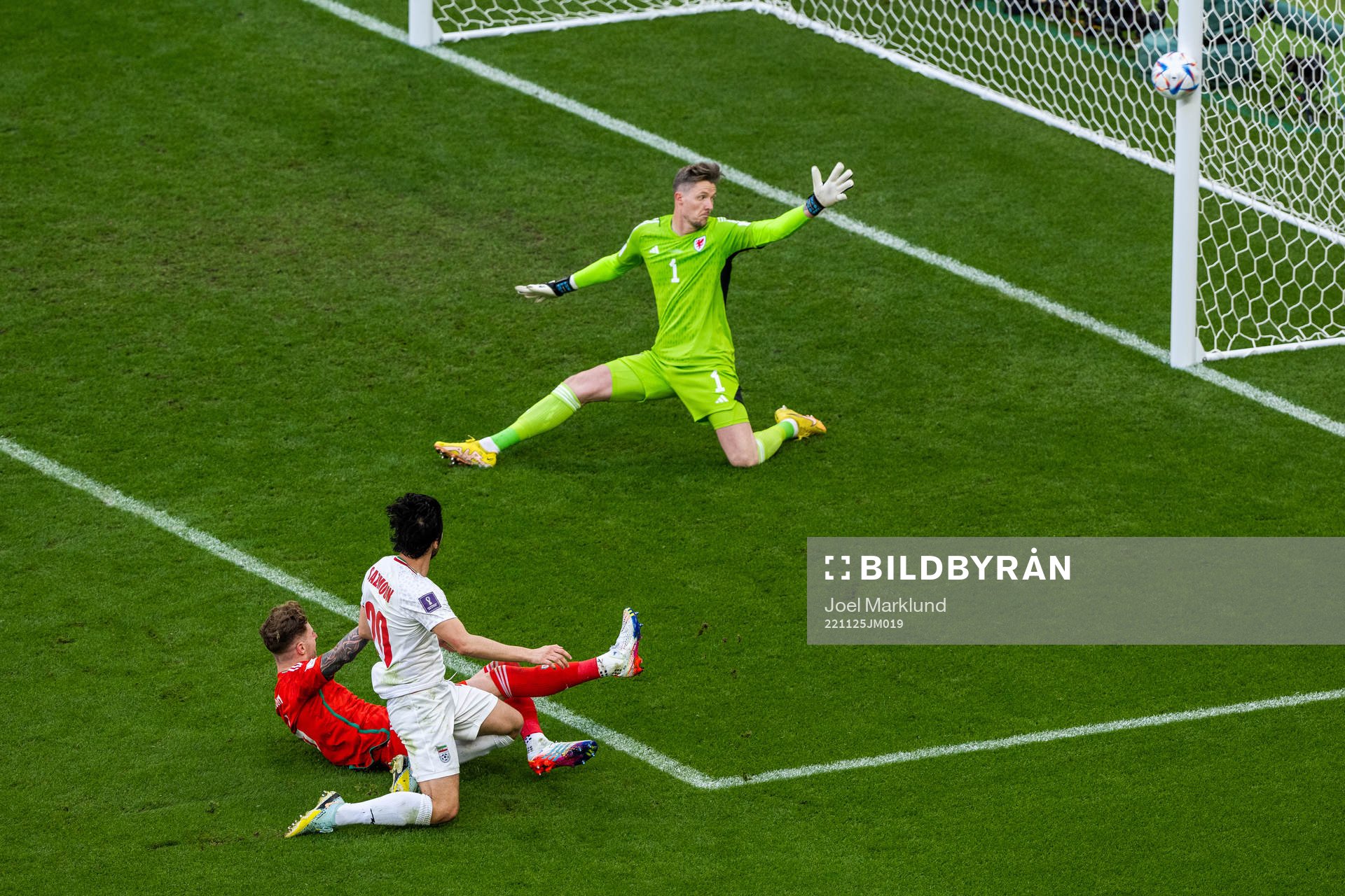 goalkeeper Wayne Hennessey of Wales see Sardar Azmoun of Iran hit the post during the FIFA World Cup 2022 football match between Wales and Iran on November 25, 2022 in Doha.