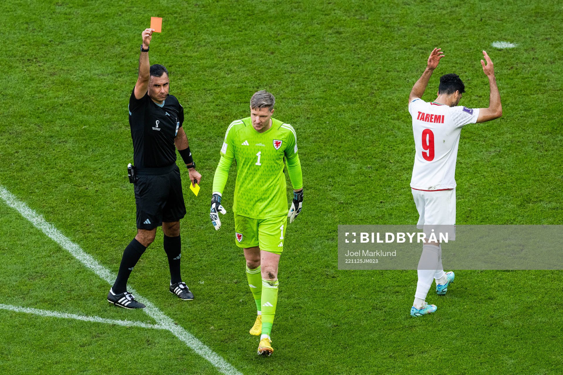 goalkeeper Wayne Hennessey of Wales receives a red card after a VAR review during the FIFA World Cup 2022 football match between Wales and Iran on November 25, 2022 in Doha.