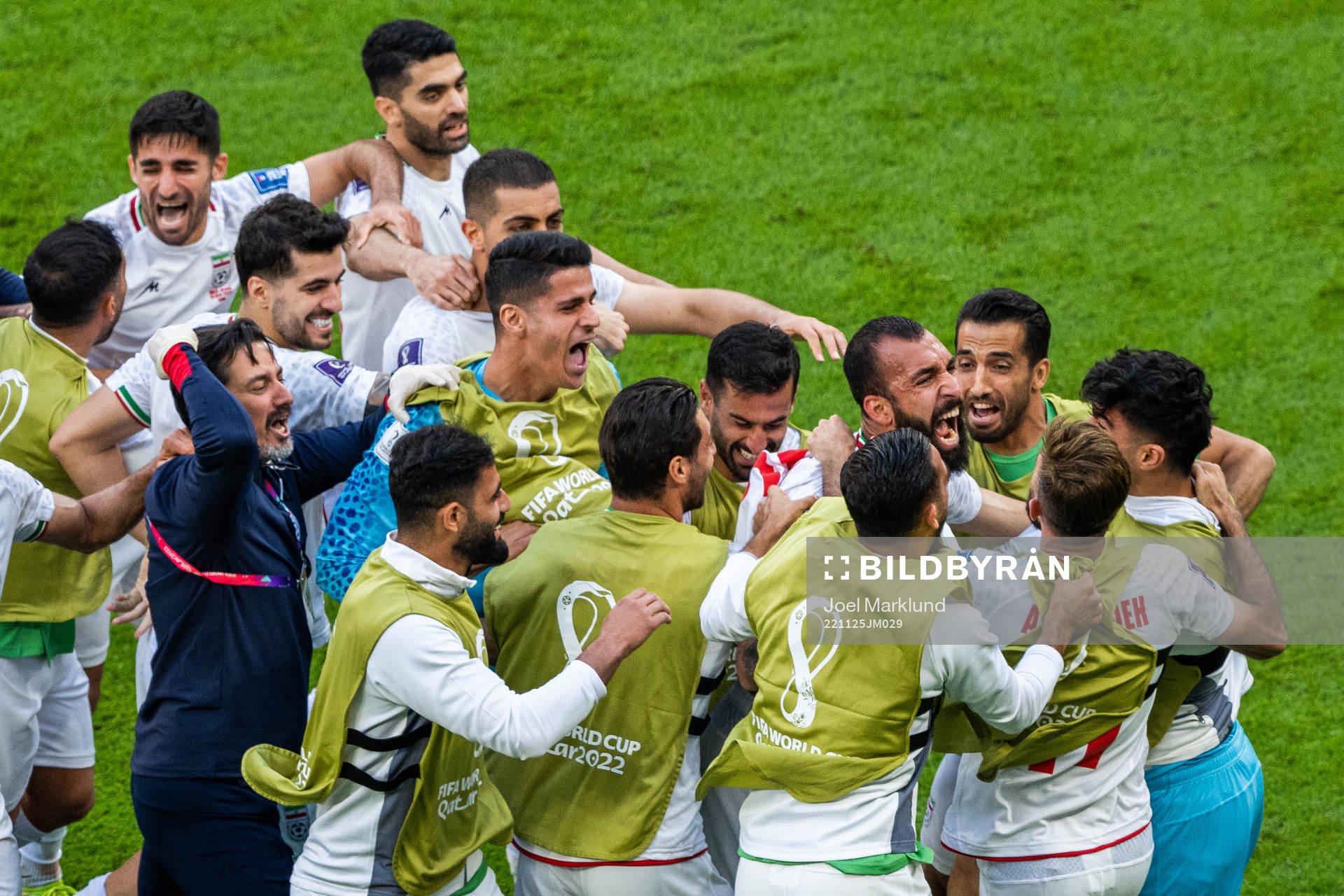 Rouzbeh Cheshmi of Iran celebrates with team mates