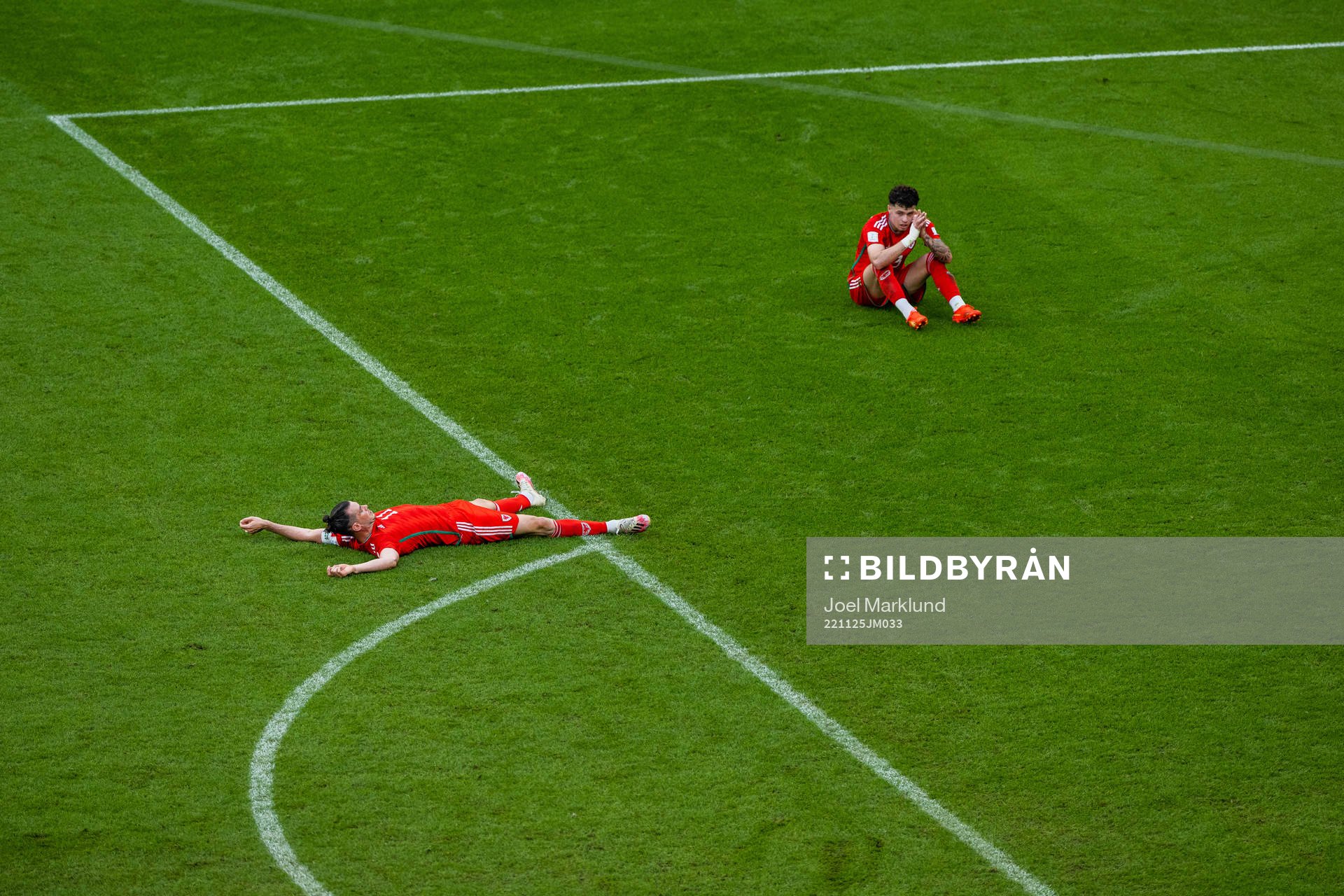 Gareth Bale and Neco Williams of Wales look dejected