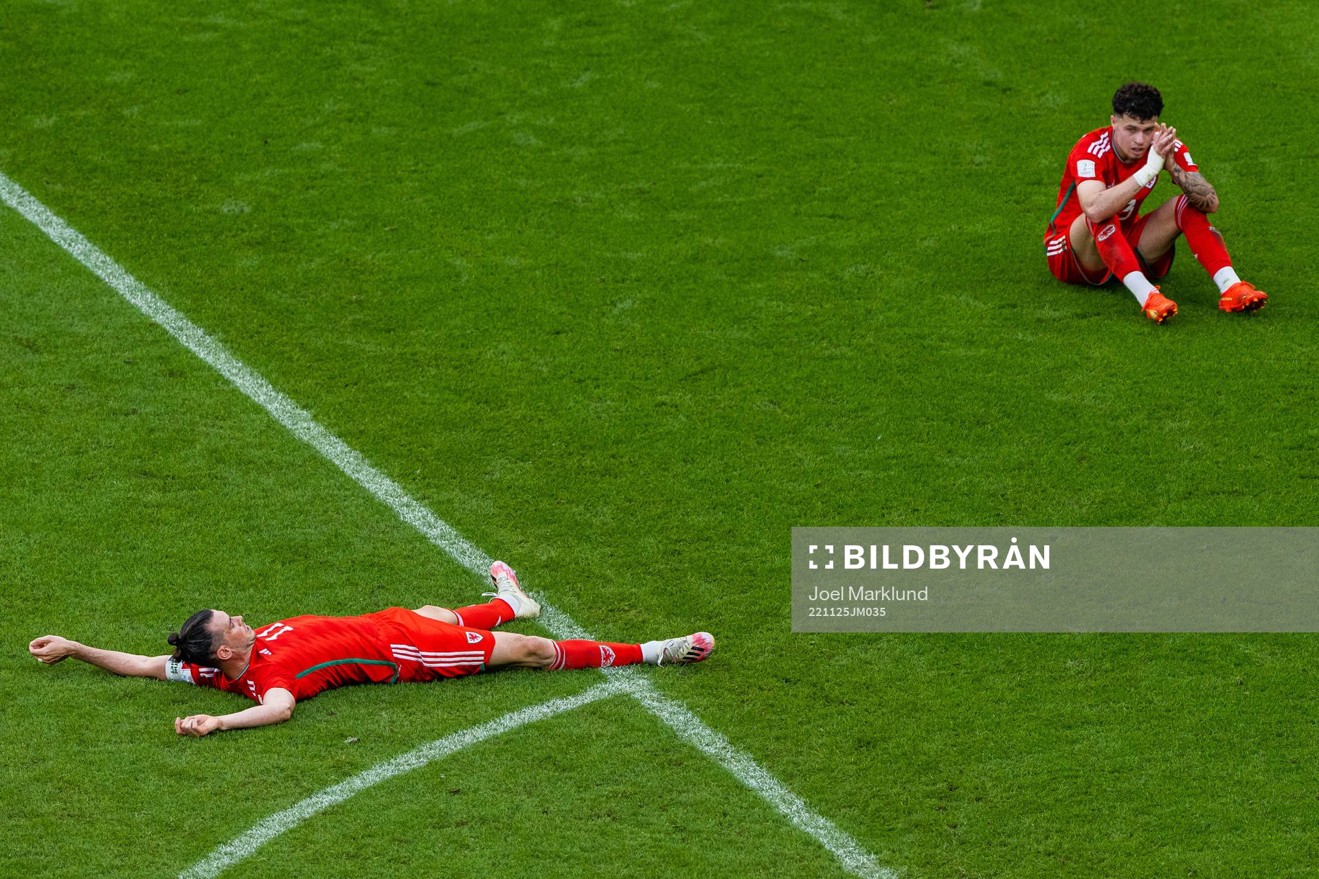 Gareth Bale and Neco Williams of Wales look dejected