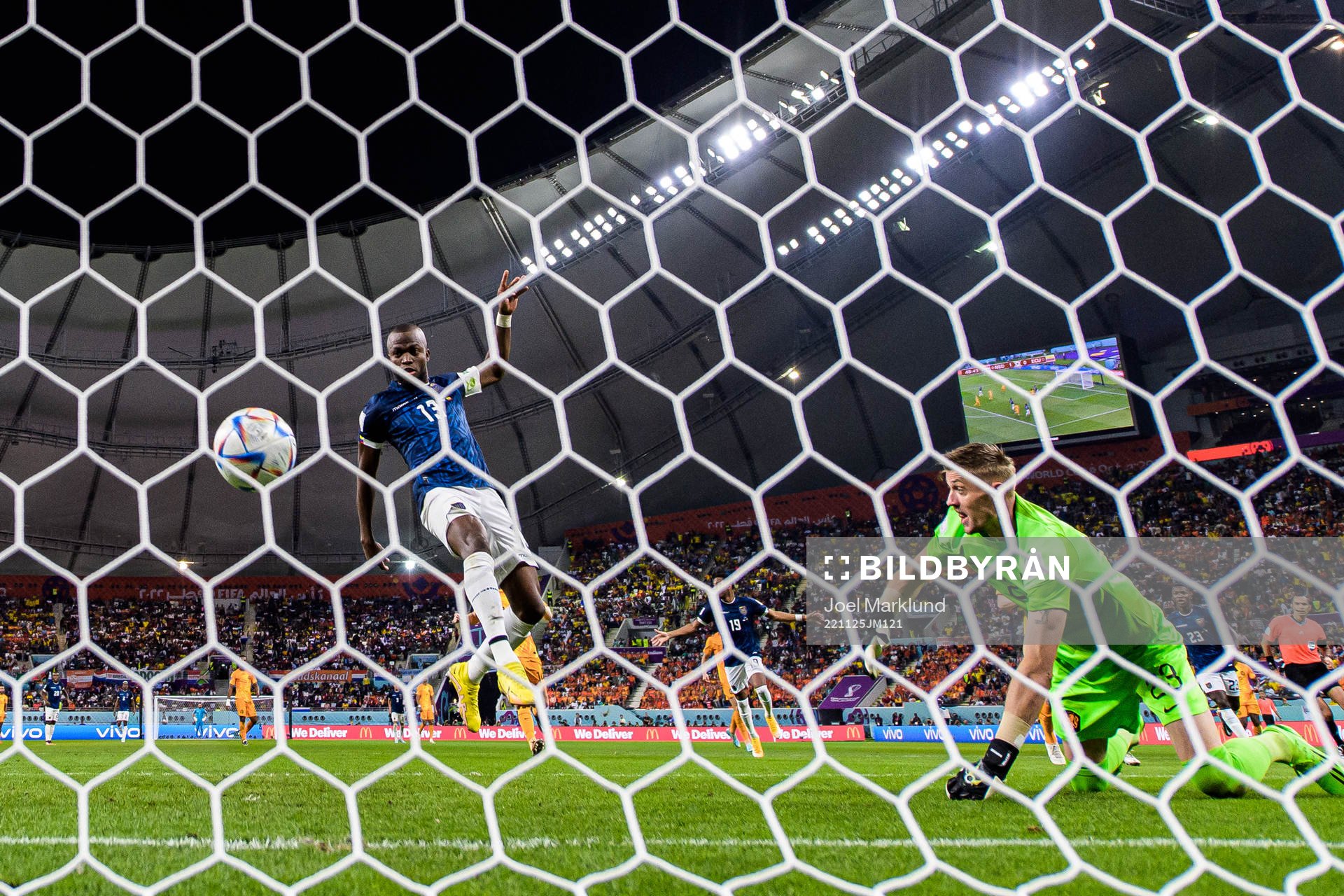 Enner Valencia of Ecuador scores 1-1 behind goalkeeper