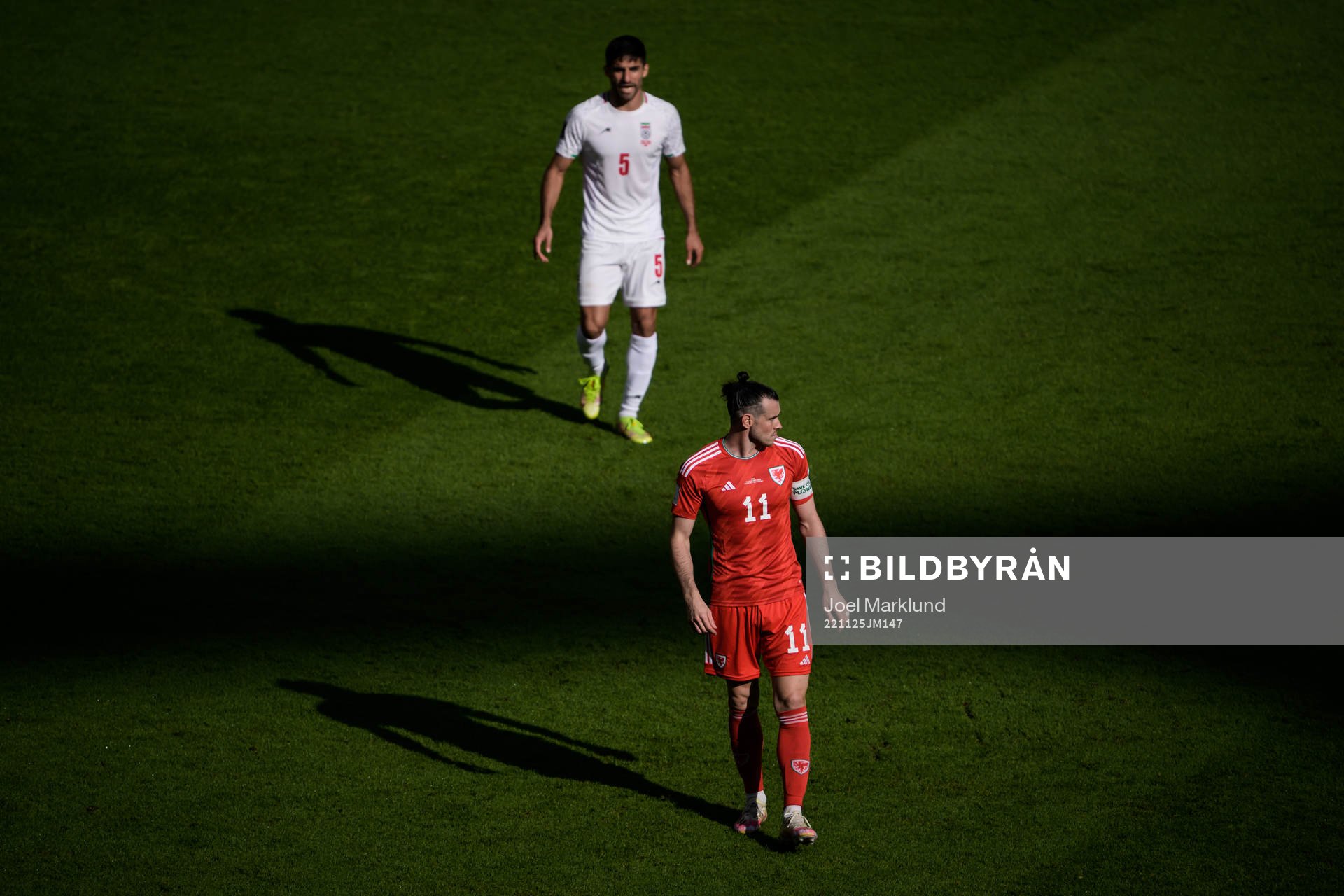 Milad Mohammadi of Iran and Gareth Bale of Wales