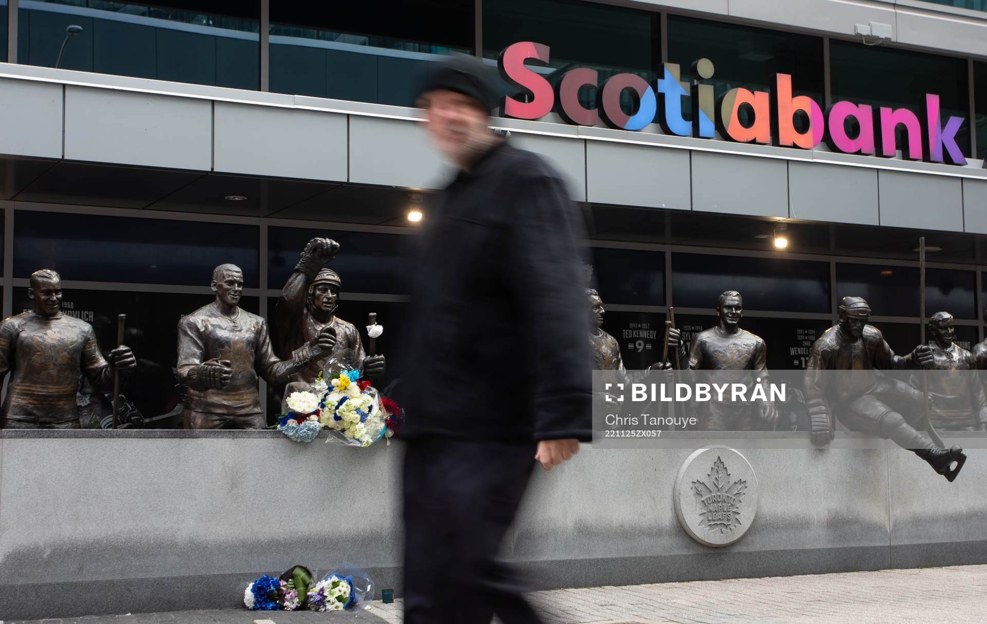 A passerby walks past at a statue of the late Börje