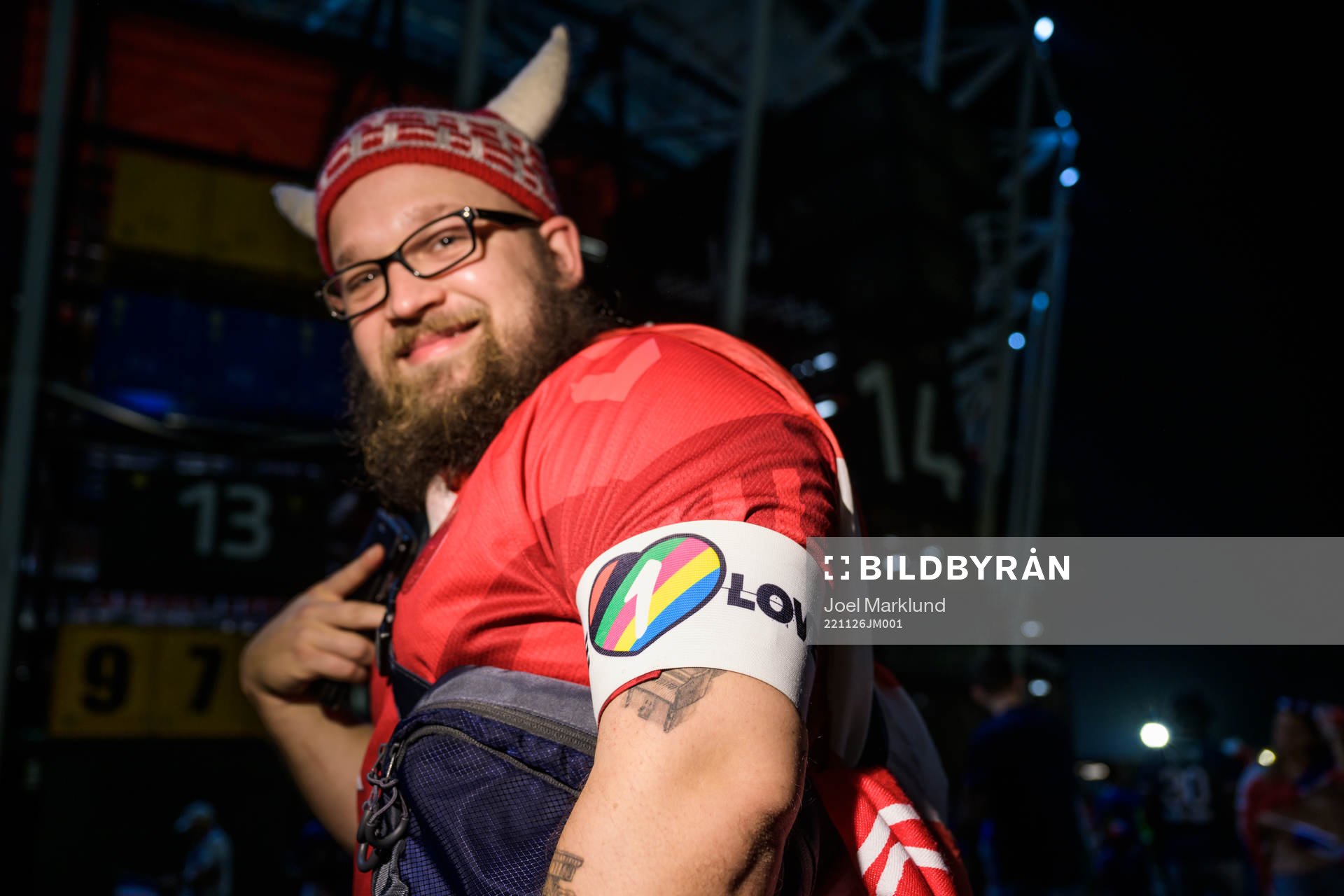 A Denmark fan poses with an One Love armband