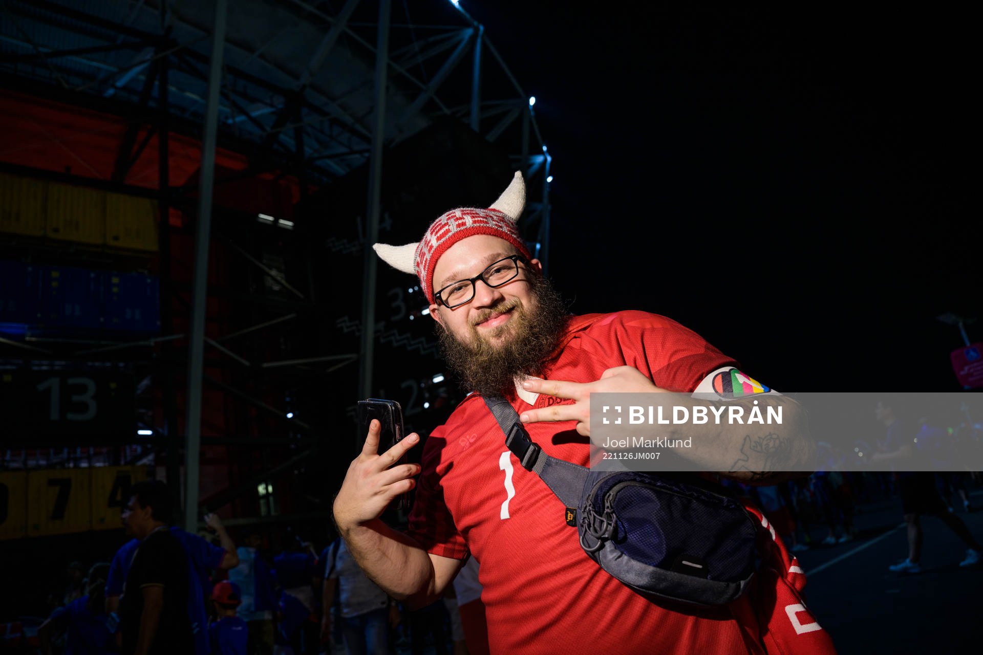 A Denmark fan poses with an One Love armband