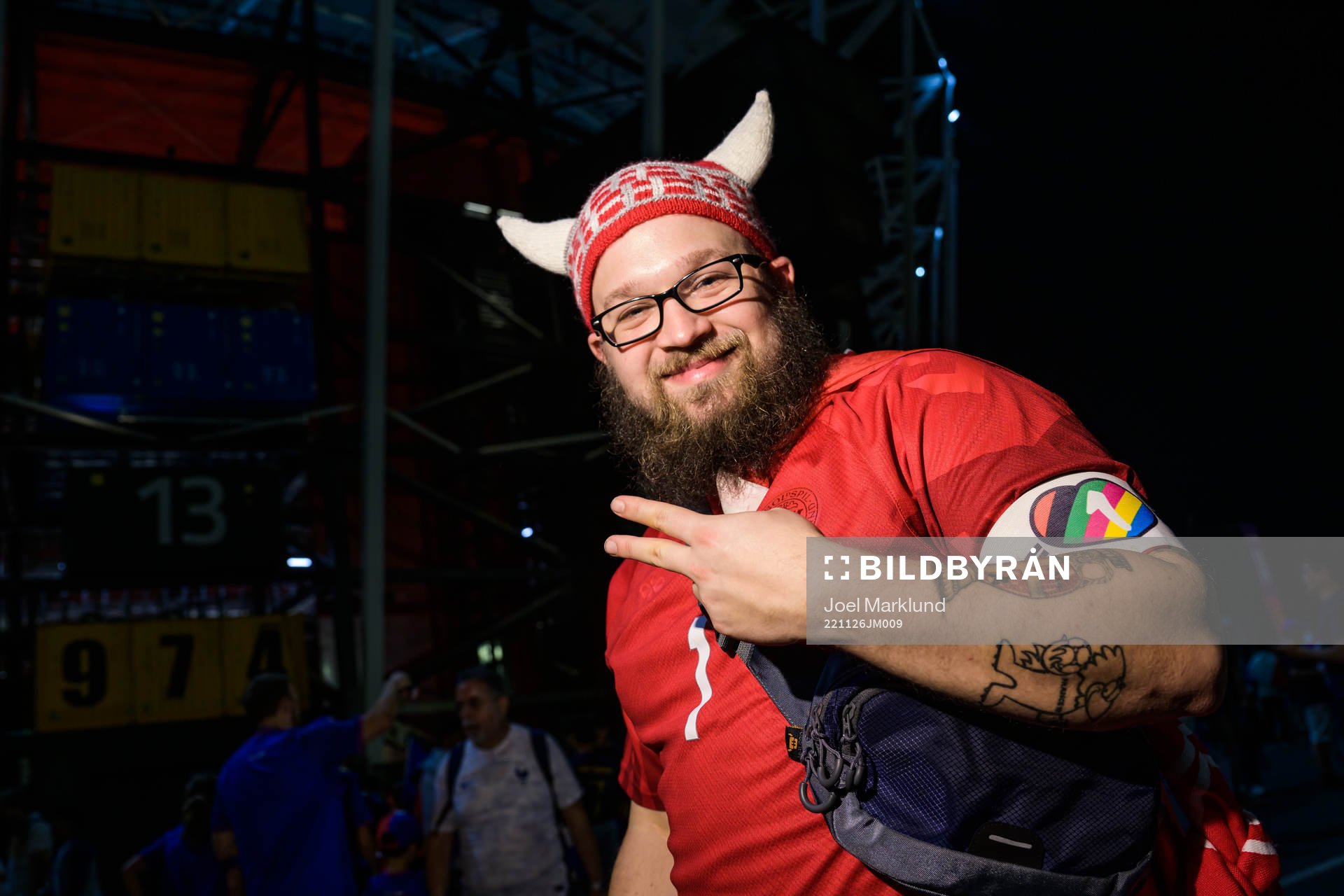 A Denmark fan poses with an One Love armband