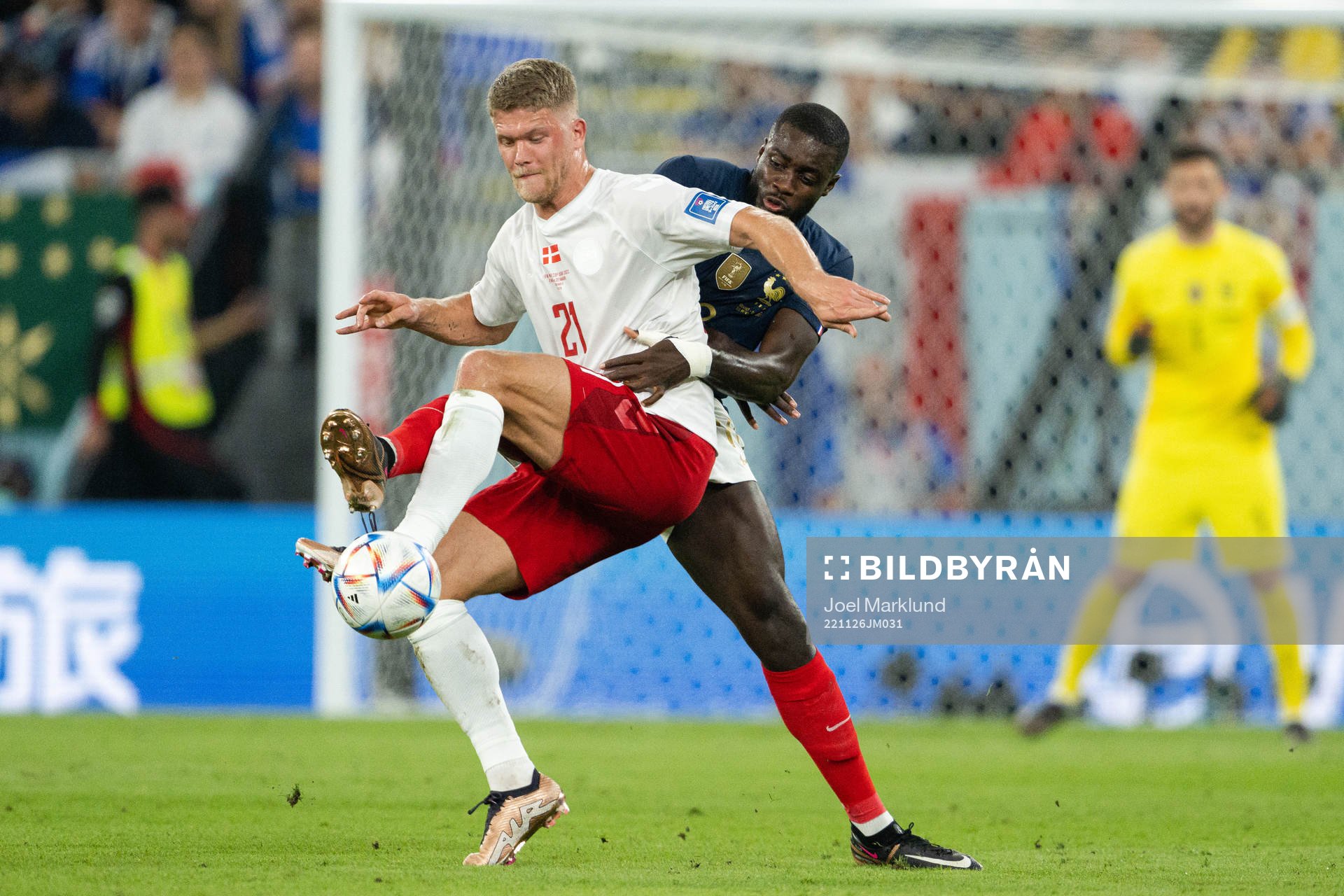 Andreas Cornelius of Denmark and Dayot Upamecano of France