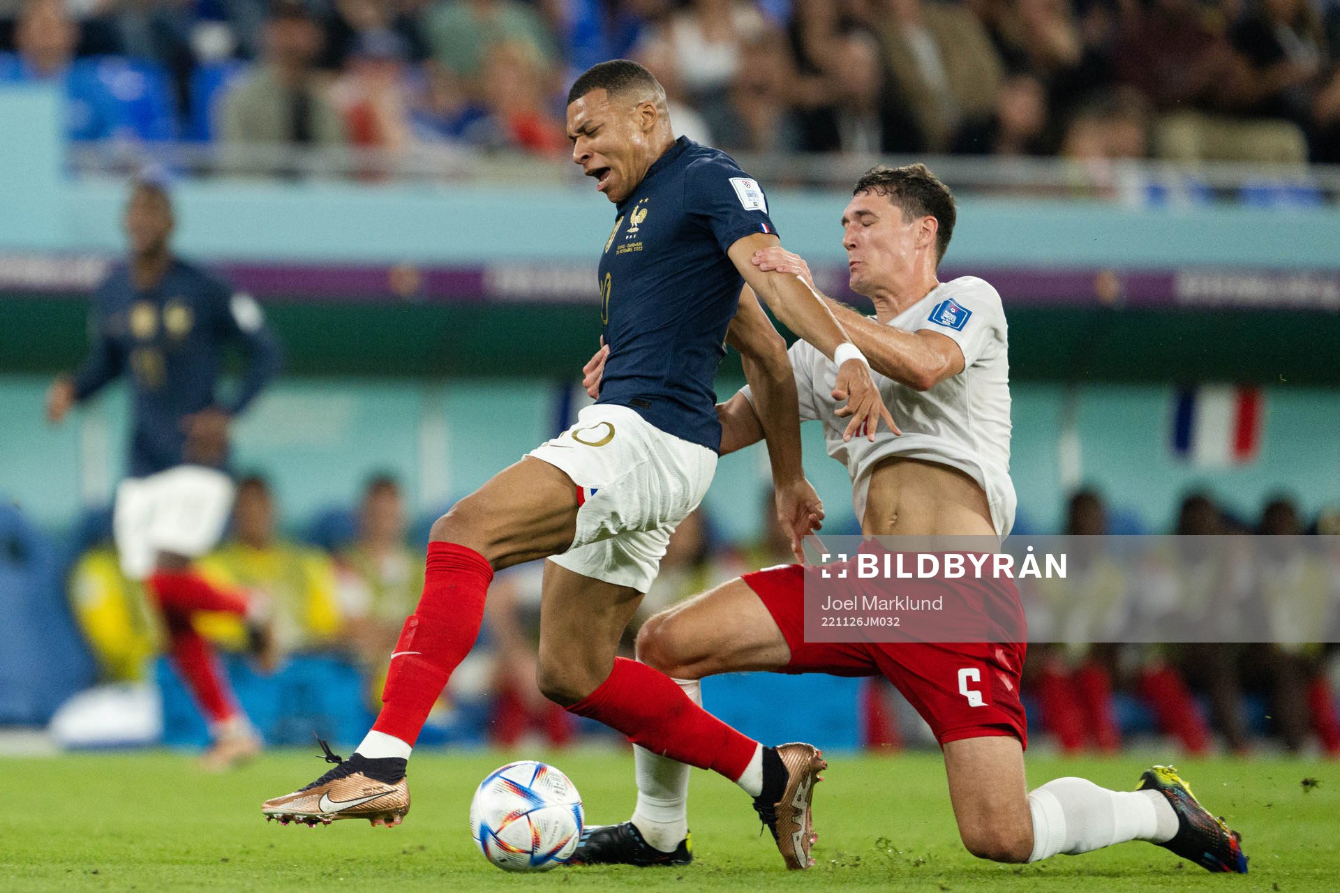 Kylian Mbappe of France and Andreas Christensen of Denmark