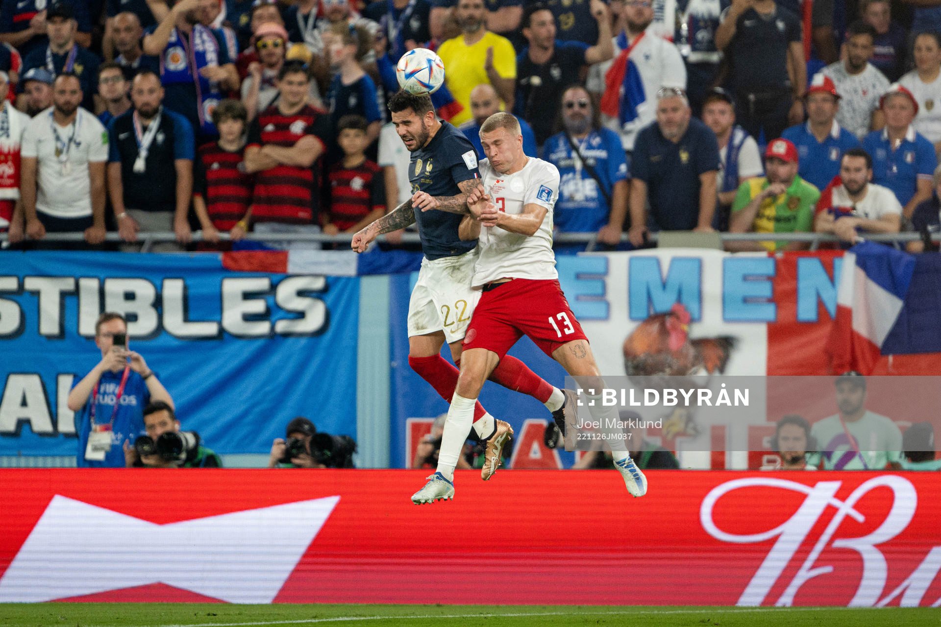 Theo Hernandez of France and Rasmus Kristensen of Denmark
