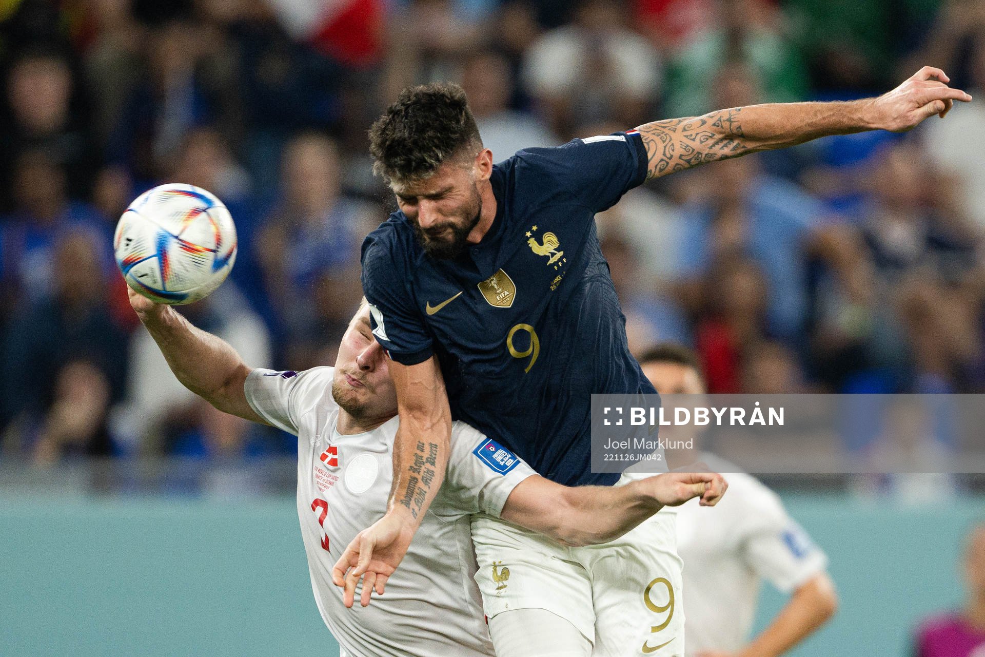 Victor Nelsson of Denmark and Olivier Giroud of France