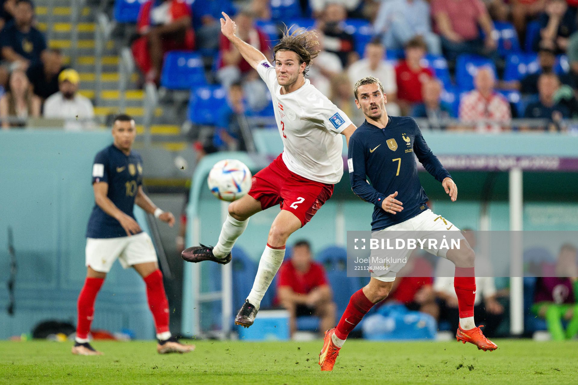 Joachim Andersen of Denmark and Antoine Griezmann of France
