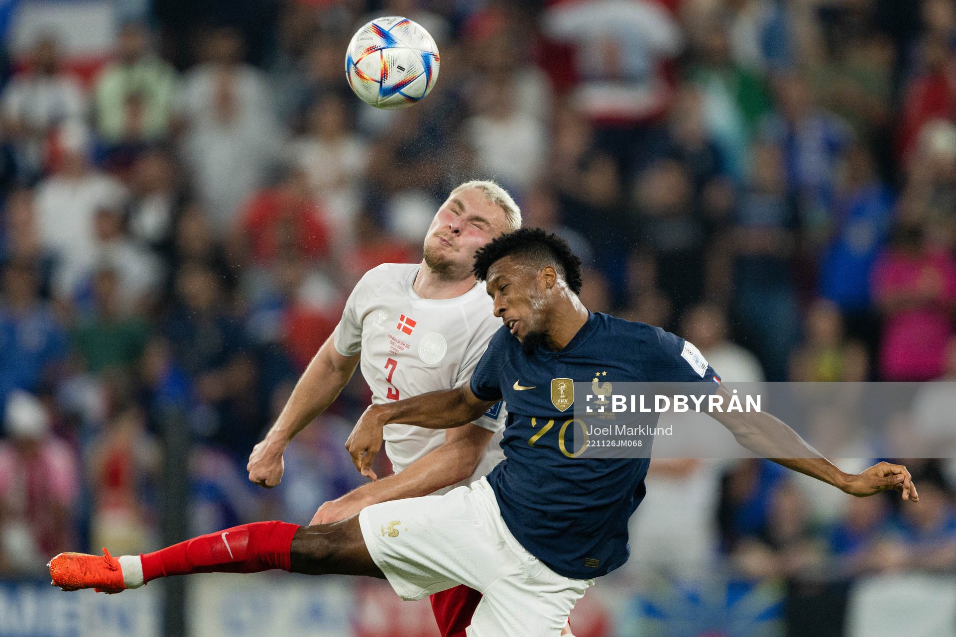 Victor Nelsson of Denmark and Kingsley Coman of France during the FIFA World Cup 2022 football match between France and Denmark on November 26, 2022 in Doha.