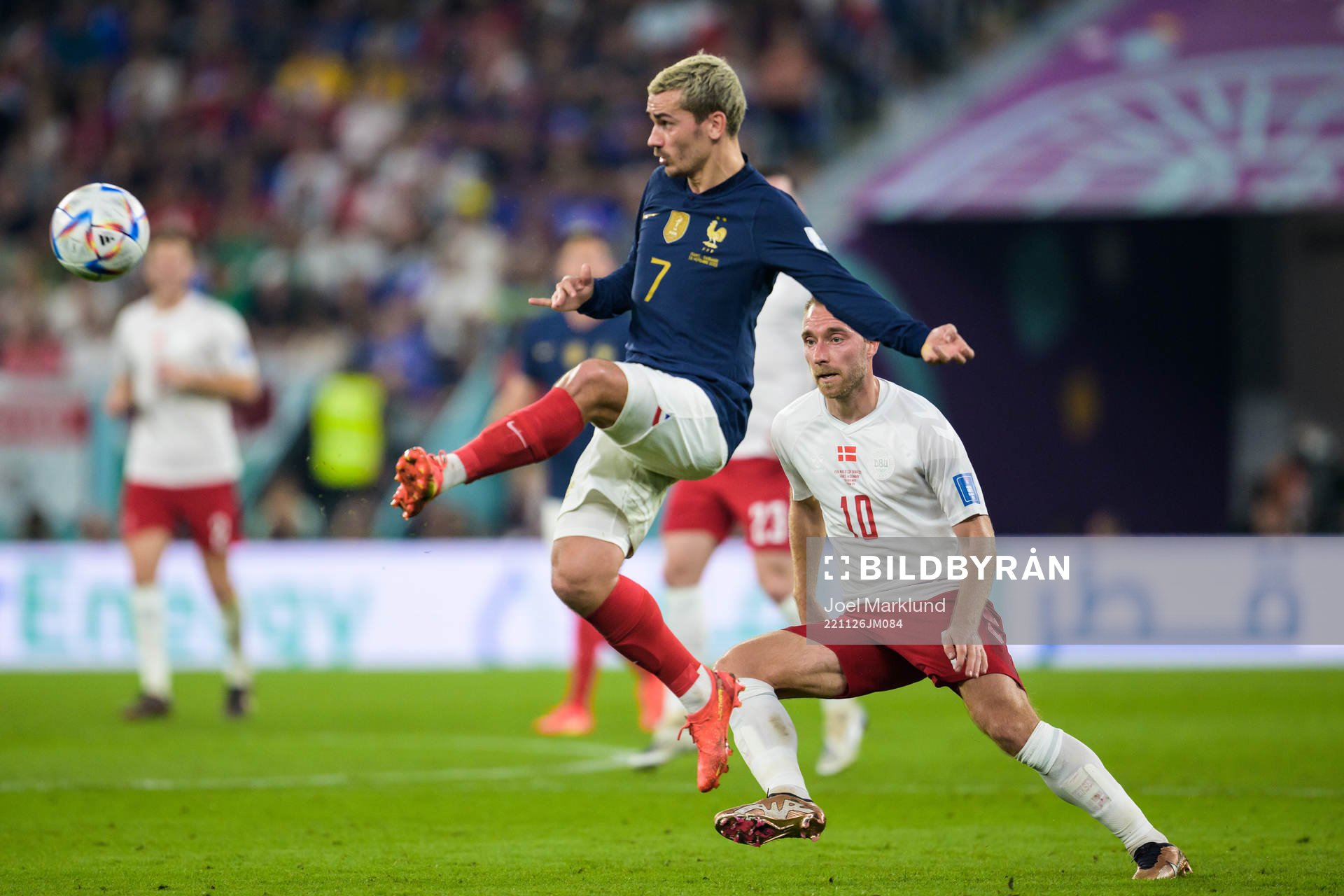 Antoine Griezmann of France and Christian Eriksen of Denmark