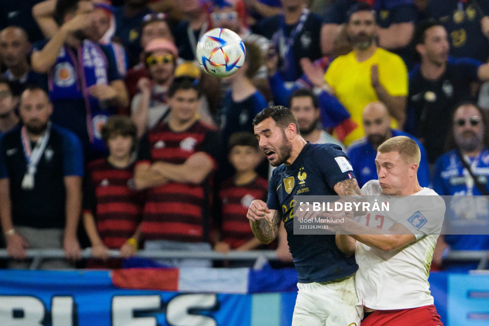 Theo Hernandez of France and Rasmus Kristensen of Denmark