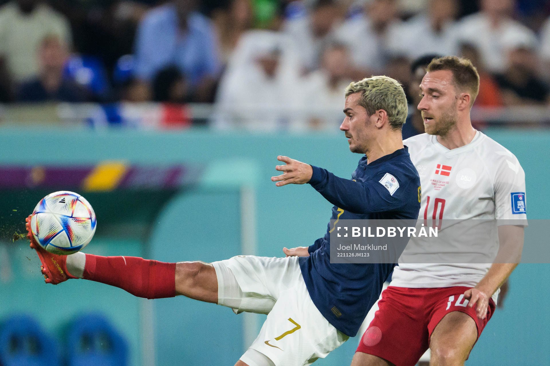 Antoine Griezmann of France and Christian Eriksen of Denmark