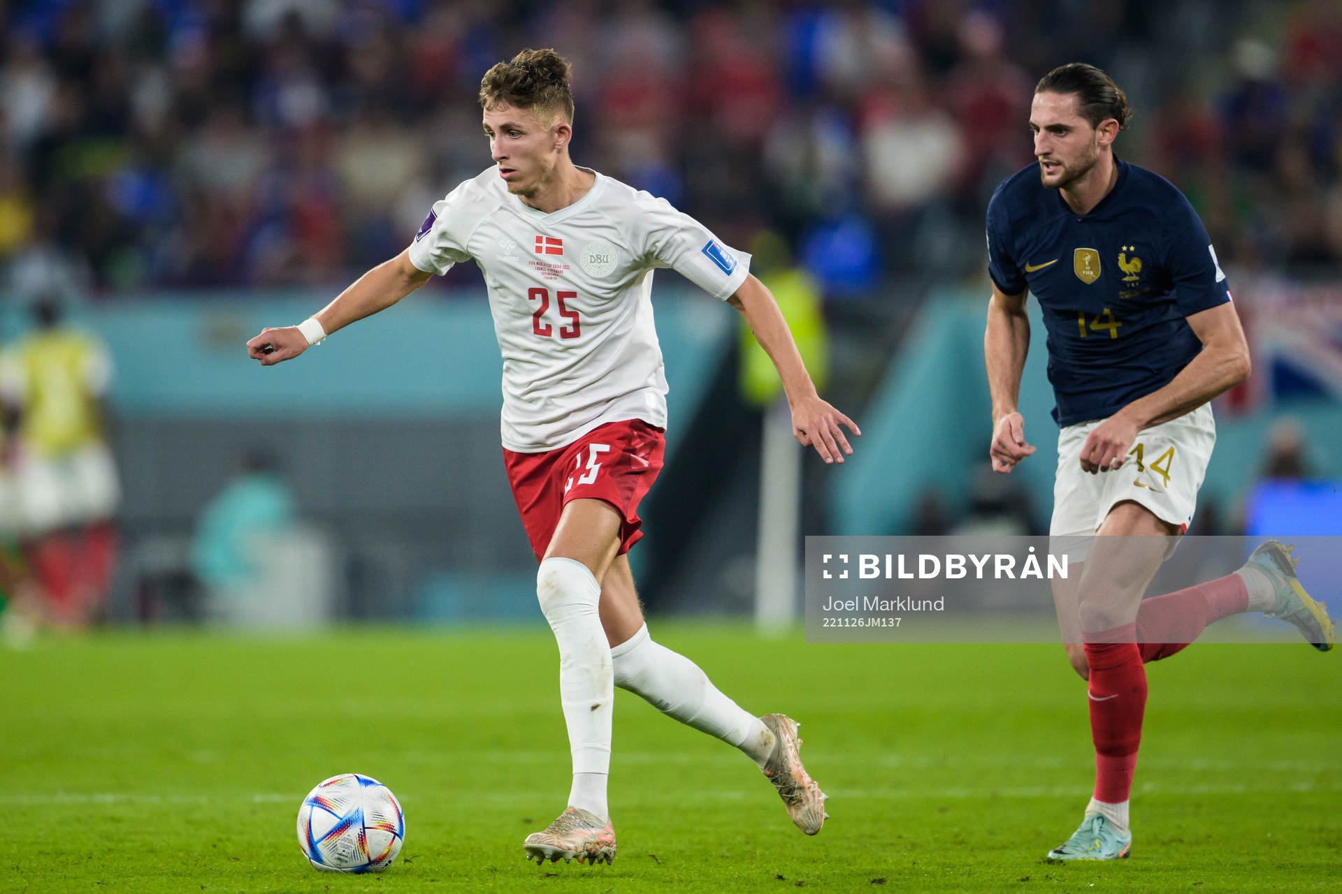 Jesper Lindstrøm of Denmark and Adrien Rabiot of France