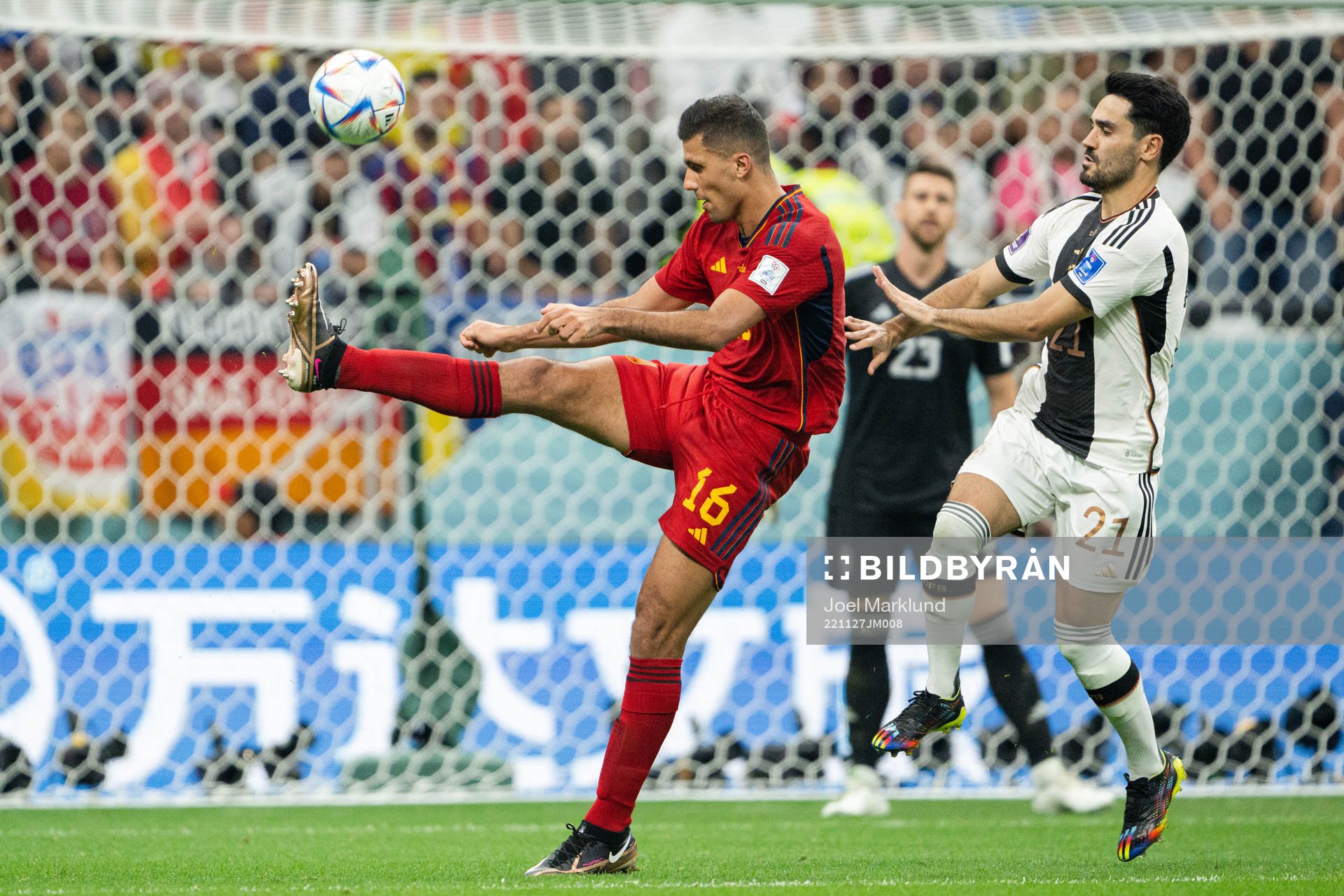 Rodri of Spain and Ilkay Gündogan of Germany