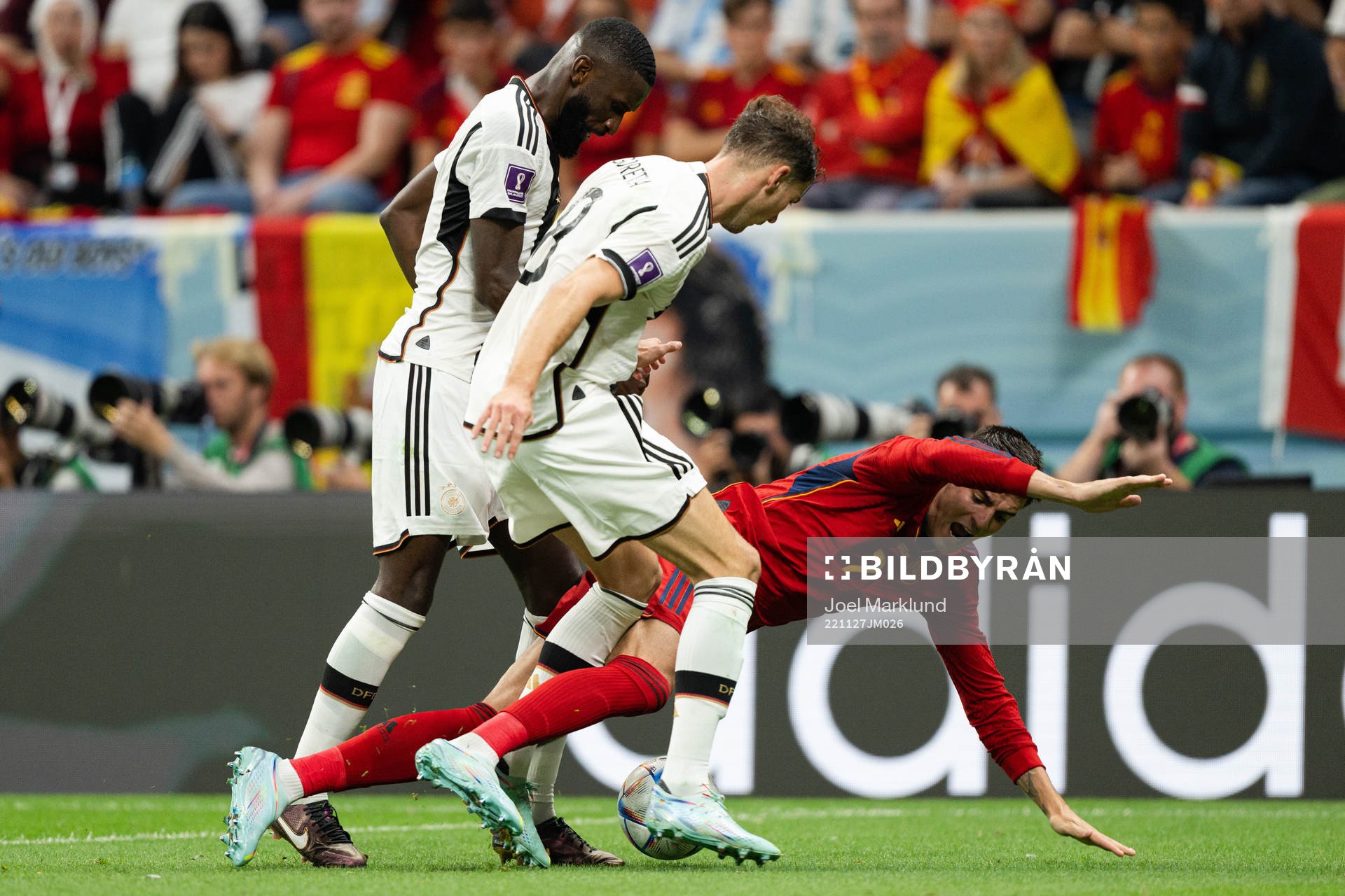 Antonio Rüdiger and Leon Goretzka of Germany against Alvaro Morata of Spain during the FIFA World Cup 2022 football match between Spain and Germany on November 27, 2022 in Doha.