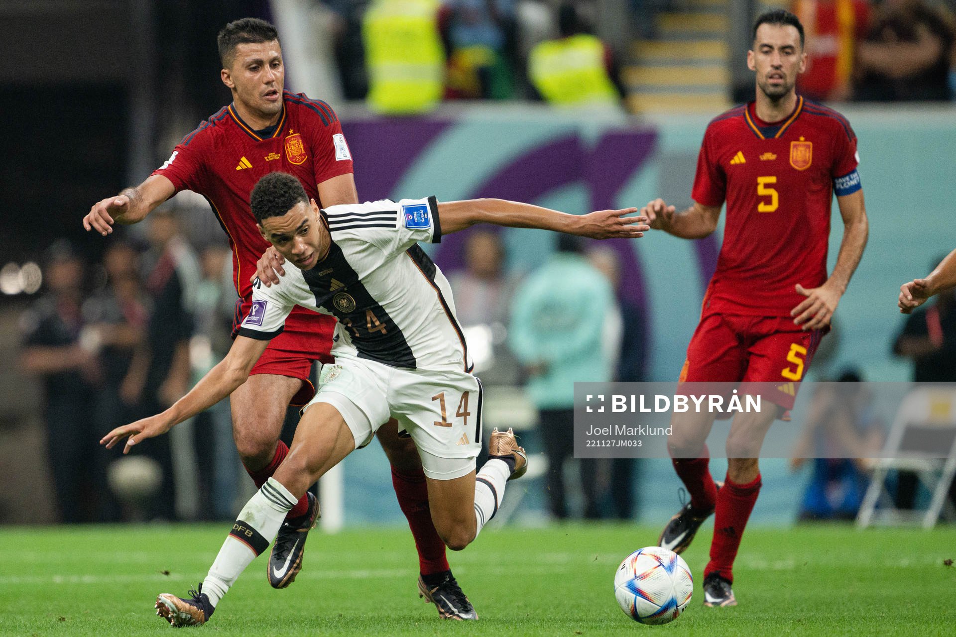 Jamal Musiala of Germany and Rodri of Spain