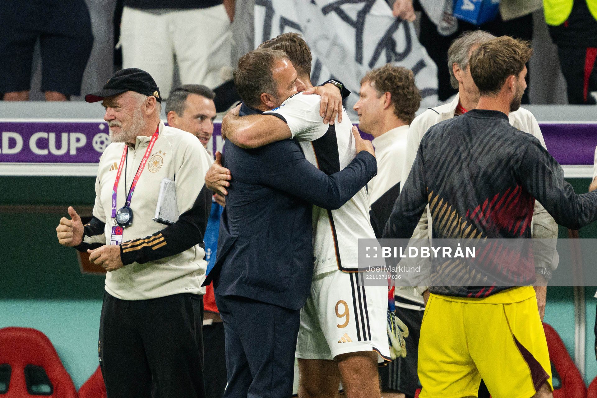 Niclas Füllkrug and head coach Hansi Flick of Germany