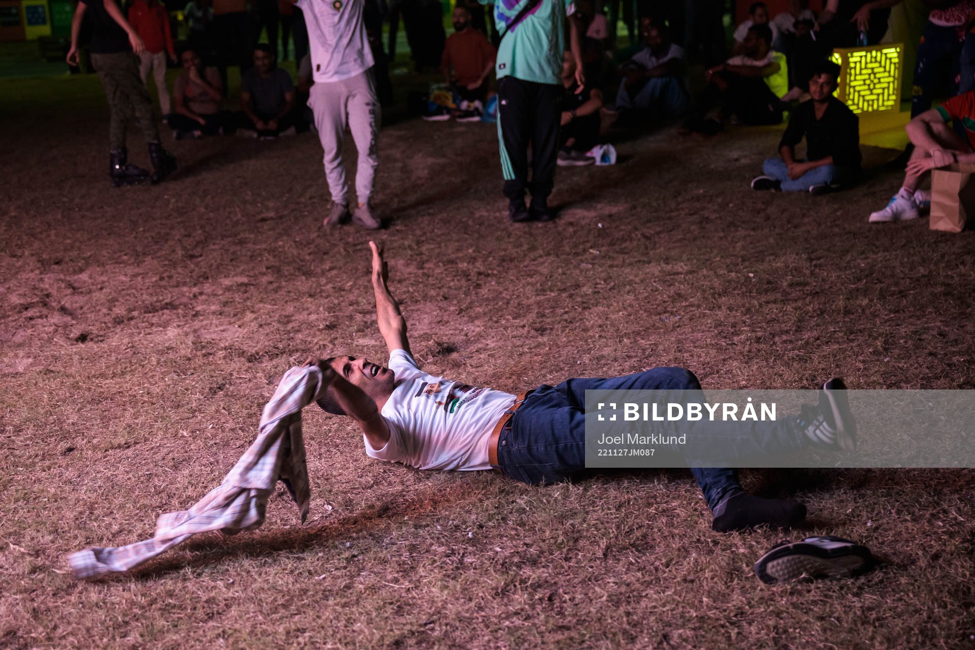 A man celebrates the 0-2 goal as he watches the match