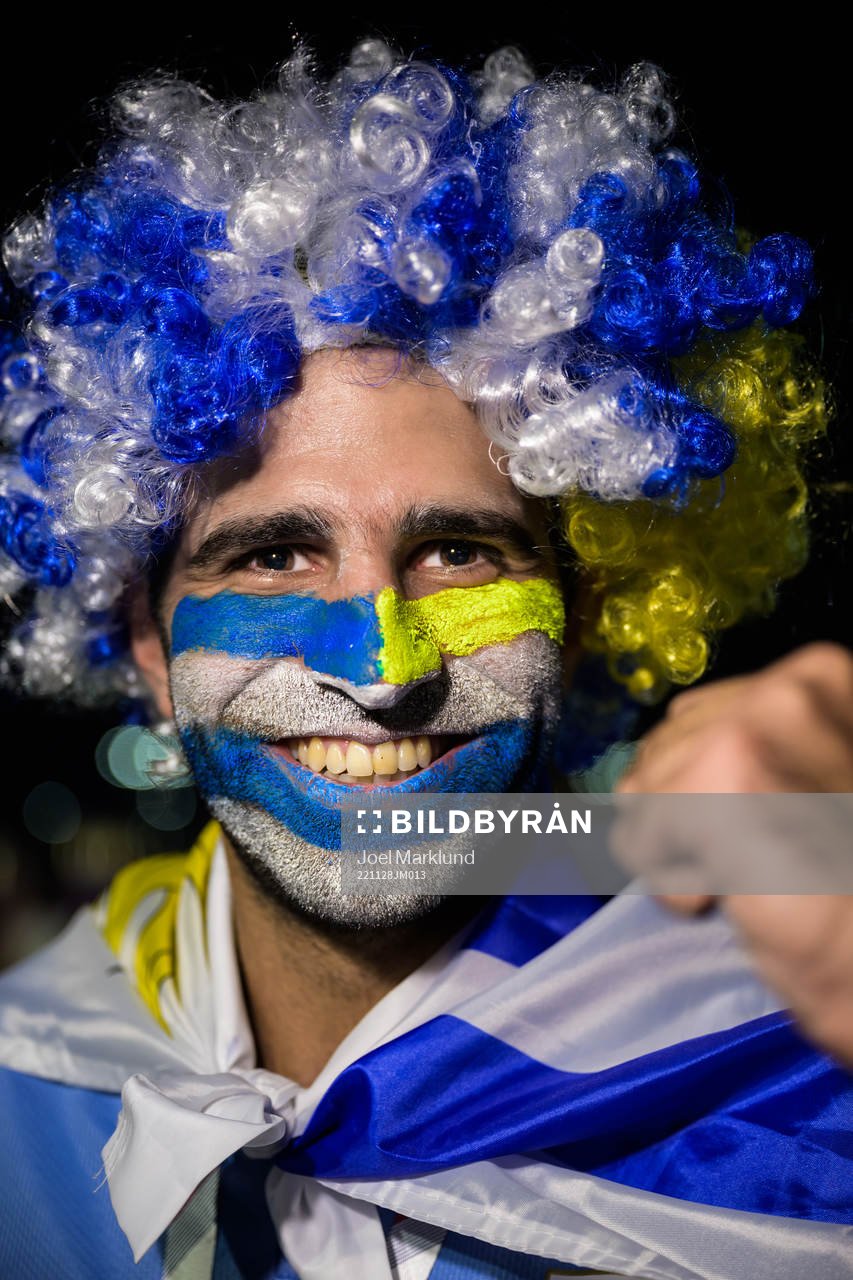 An Uruguay fan poses for a portrait