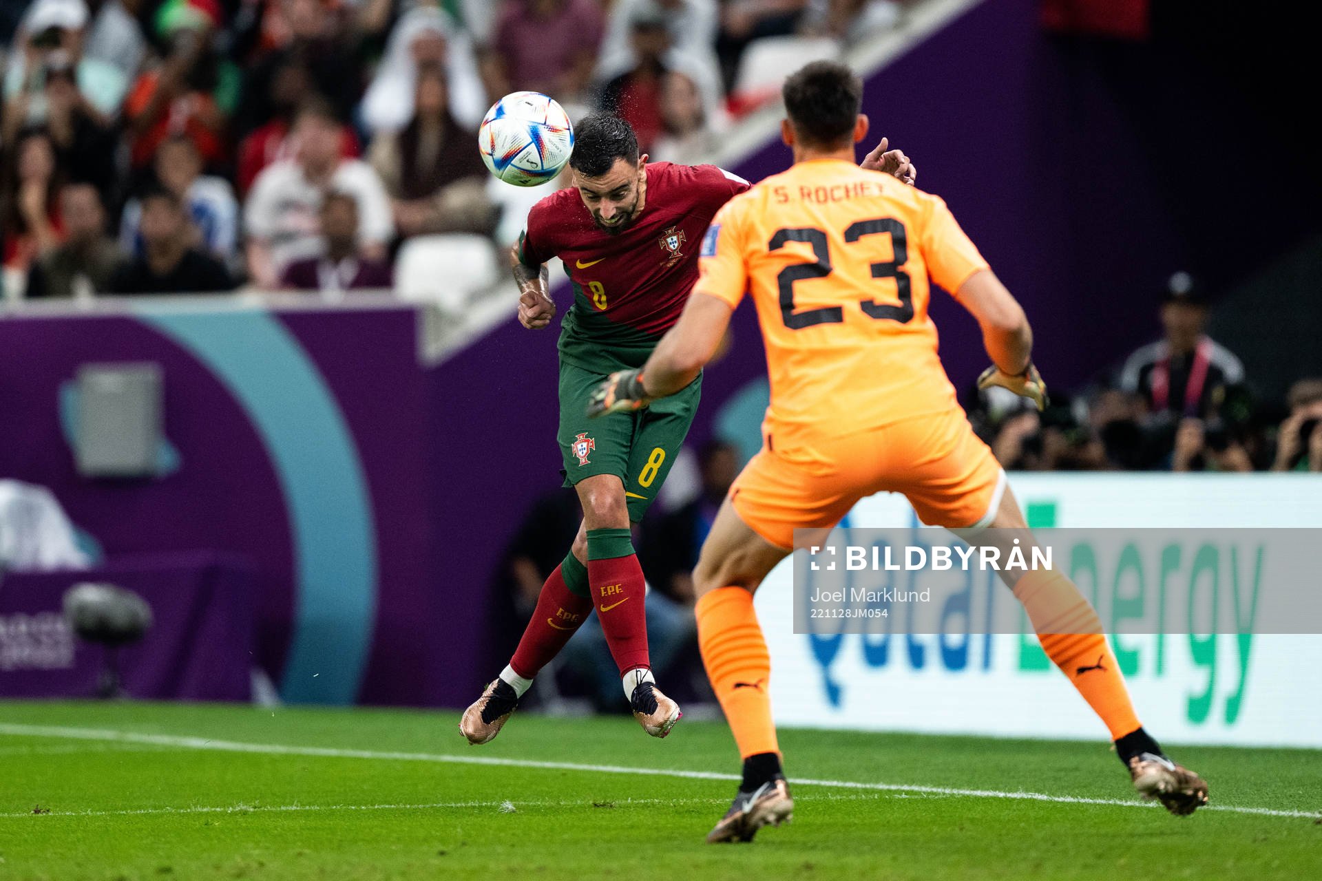 Bruno Fernandes of Portugal and goalkeeper Sergio Rochet of