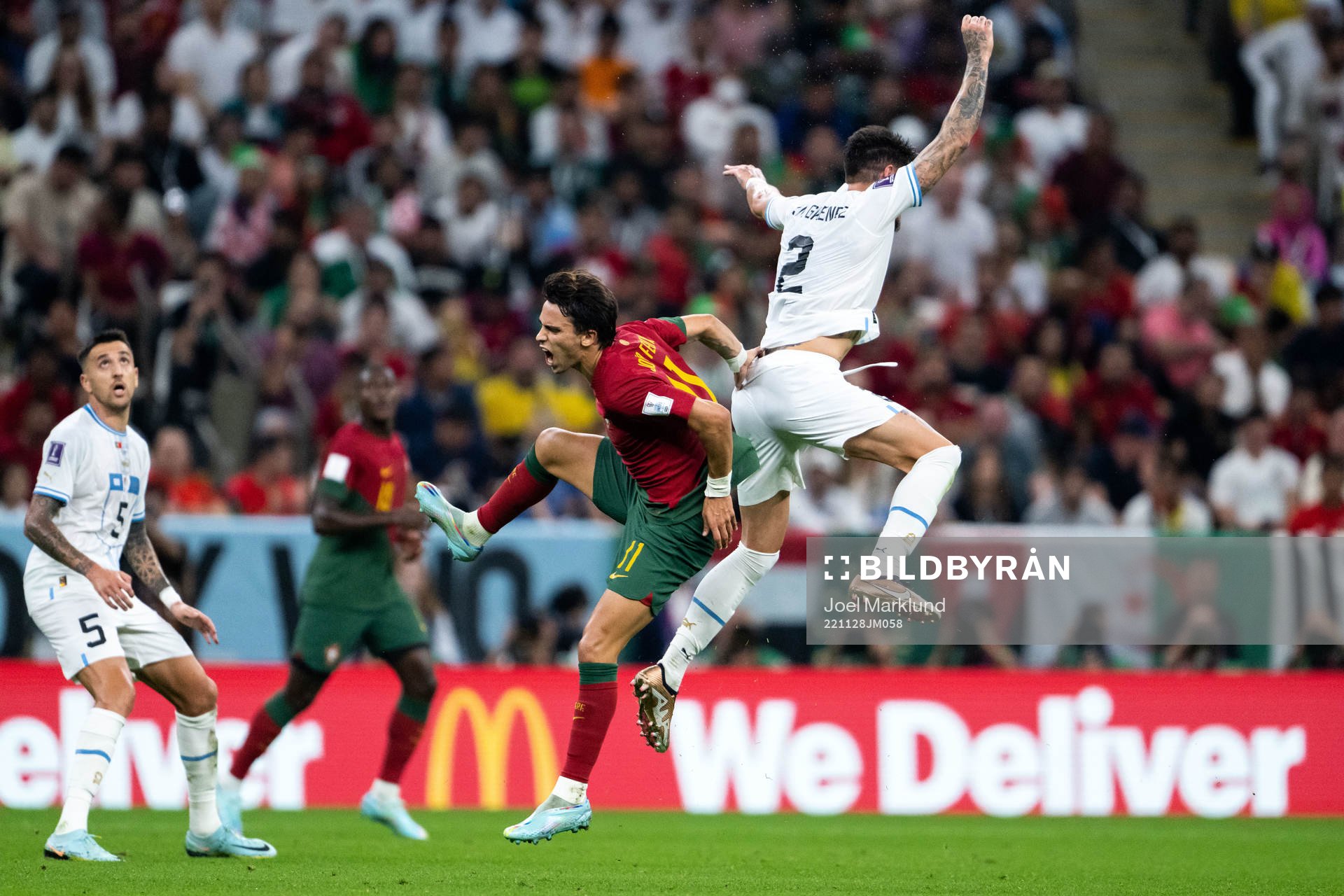 Joao Felix of Portugal and Jose Maria Gimenez of Uruguay