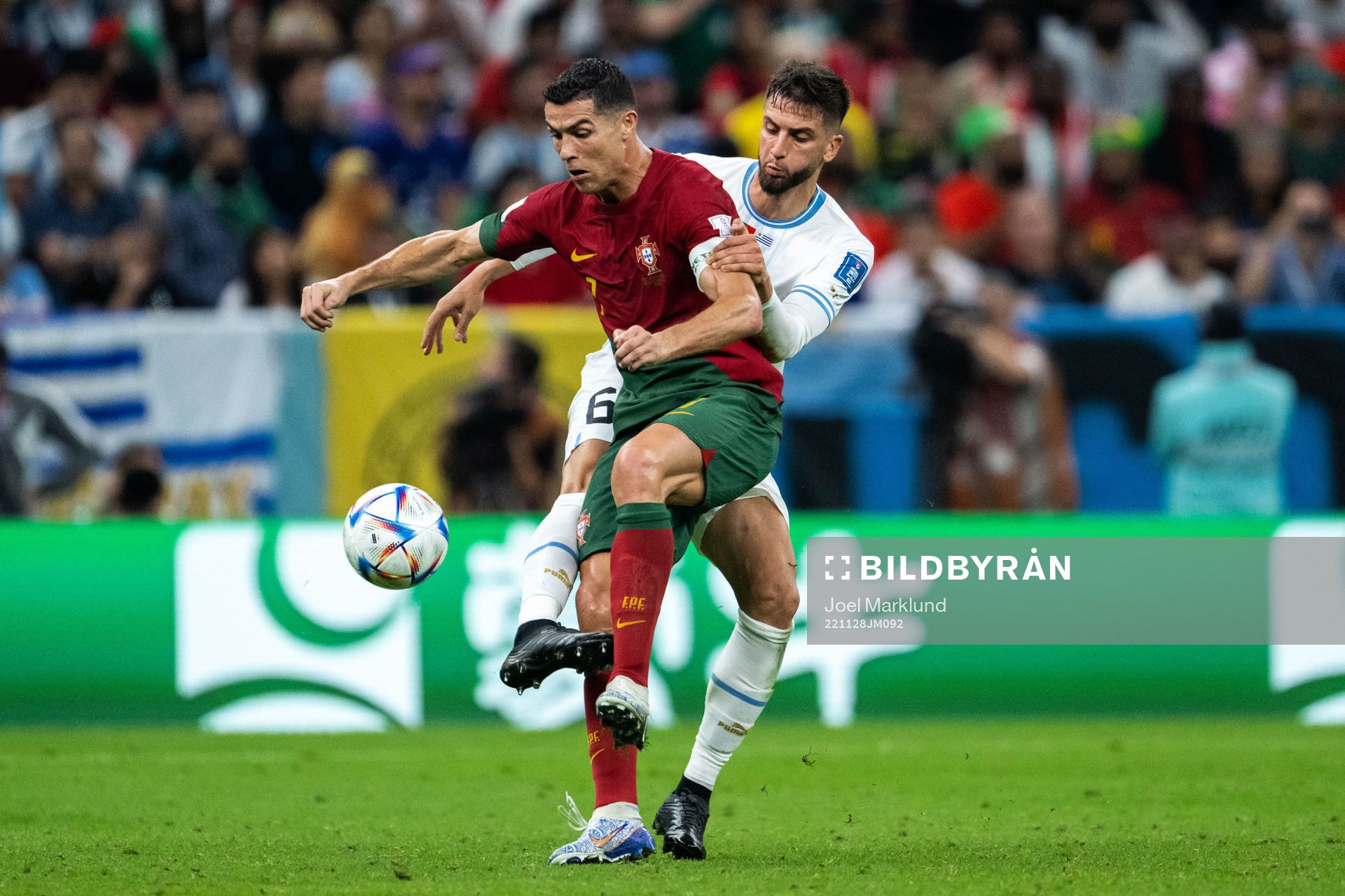 Rodrigo Bentancur of Uruguay and Cristiano Ronaldo of Portugal during the FIFA World Cup 2022 football match between Portugal and Uruguay on November 28, 2022 in Doha.