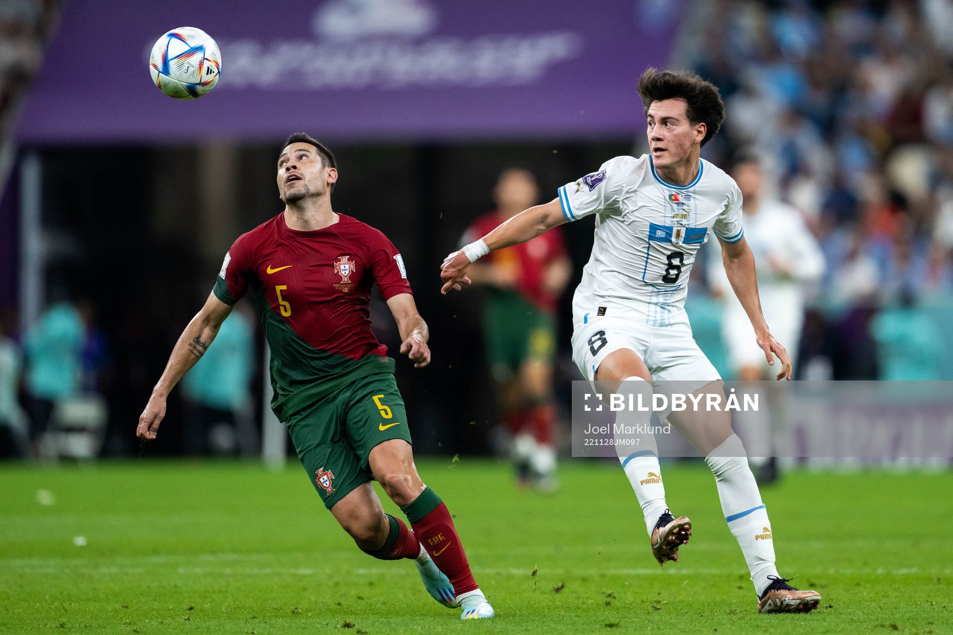 Raphael Guerreiro of Portugal and Facundo Pellistri of