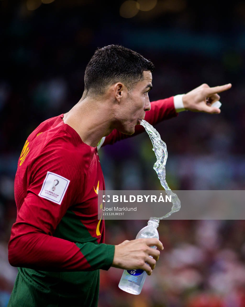 Cristiano Ronaldo of Portugal spits water