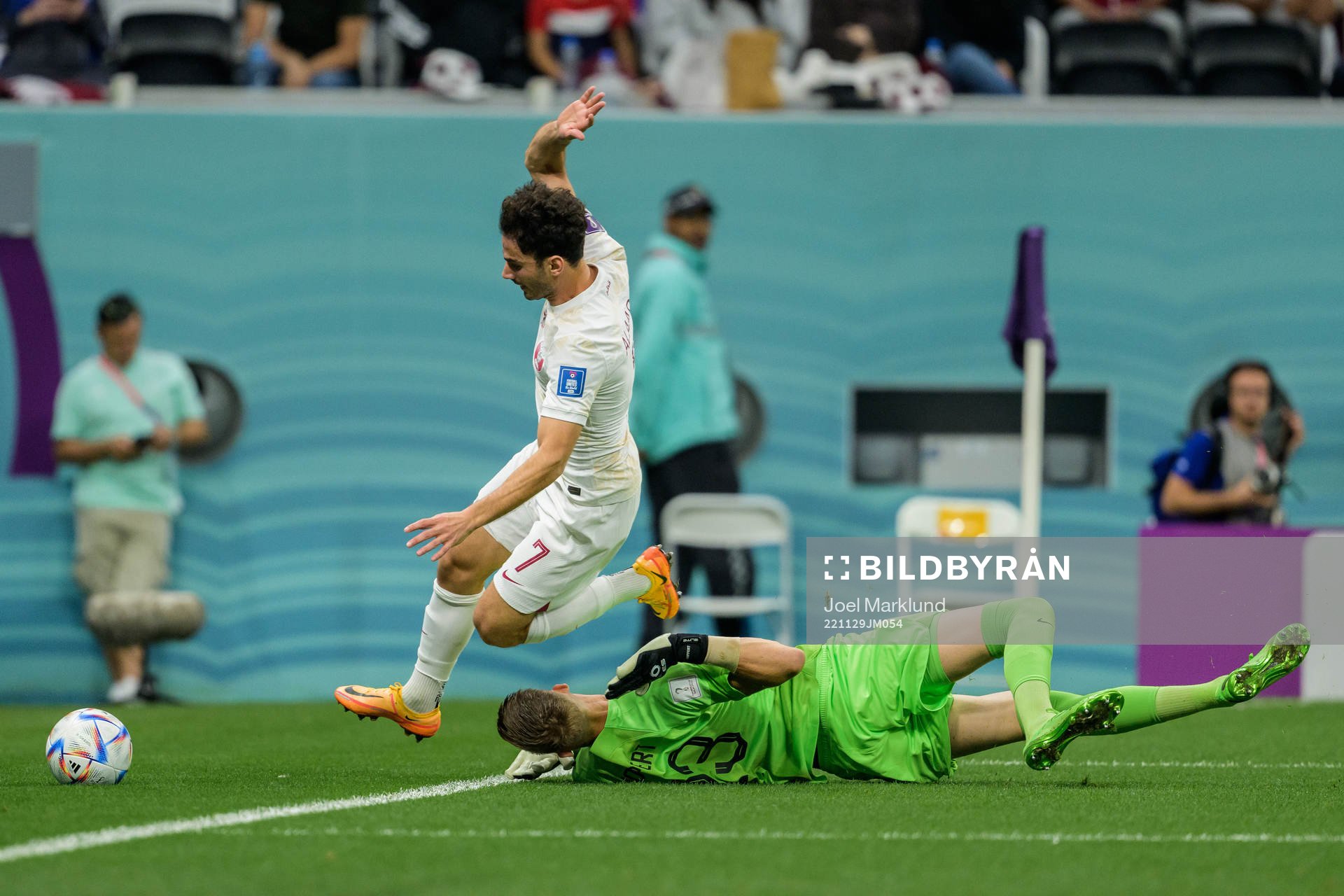 Ahmed Alaaeldin of Qatar and goalkeeper Andries Noppert of