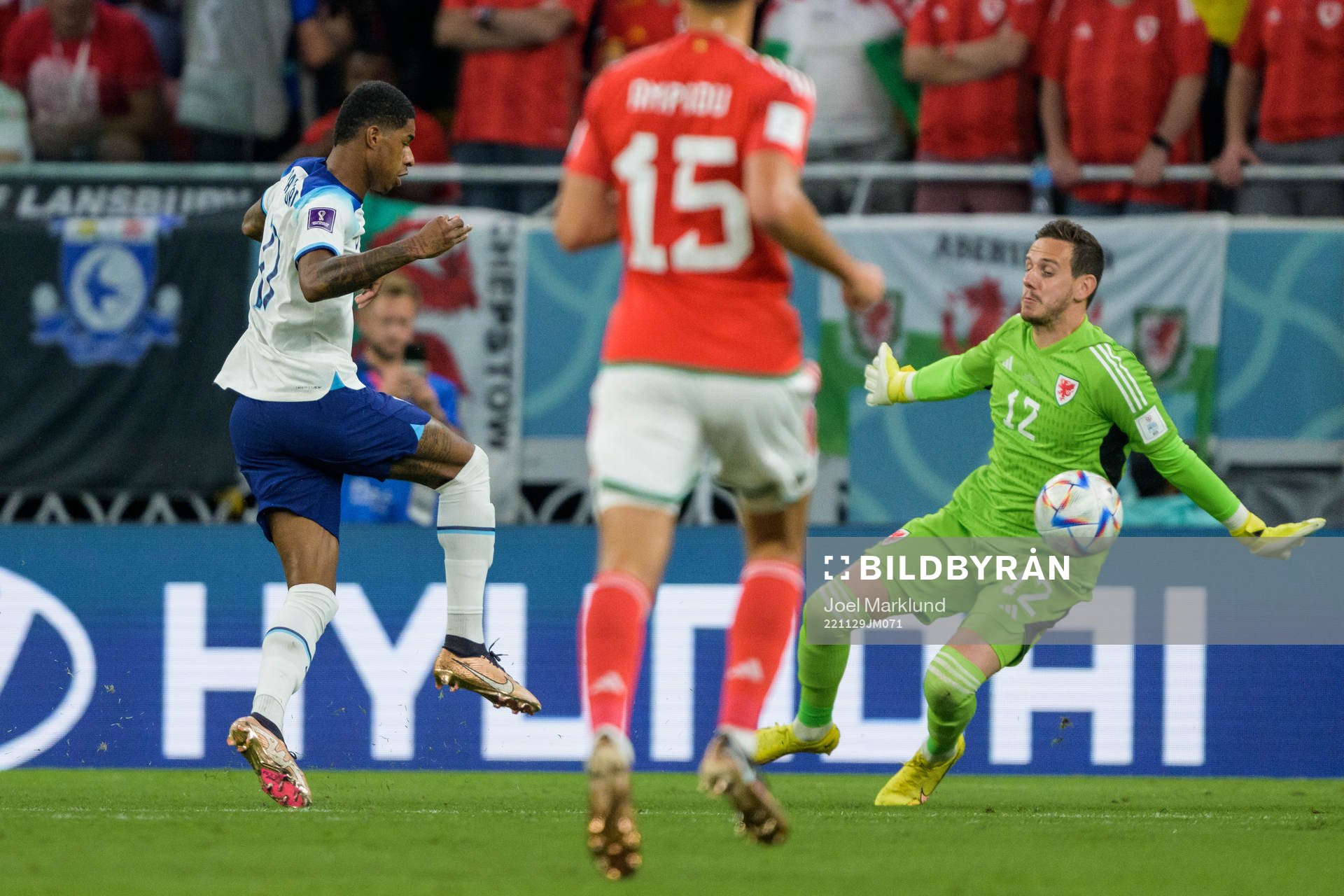 Marcus Rashford of England and goalkeeper Danny Ward of Wales during the FIFA World Cup 2022 football match between Wales and England on November 29, 2022 in Doha.