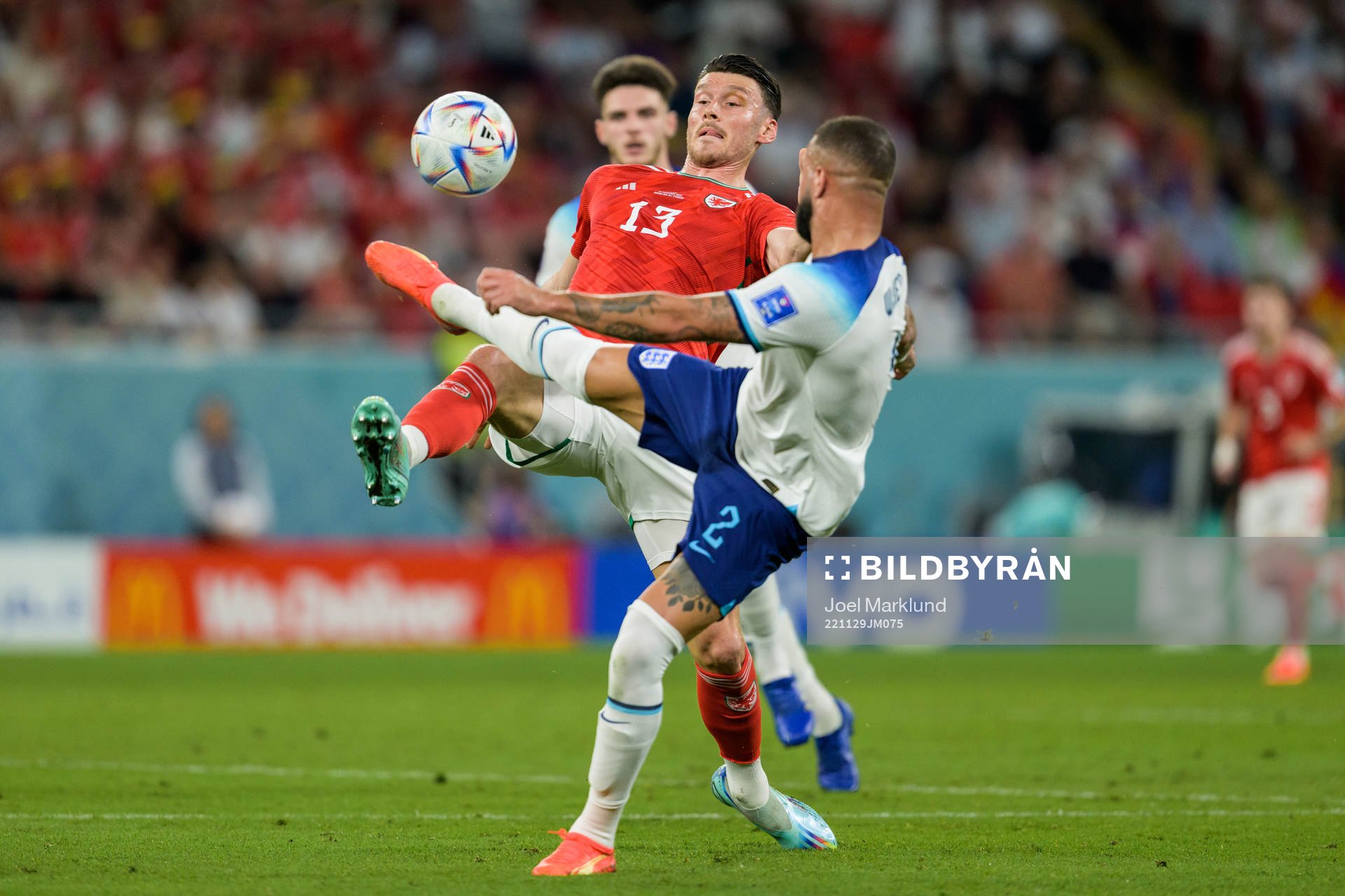 Kieffer Moore of Wales and Kyle Walker of England