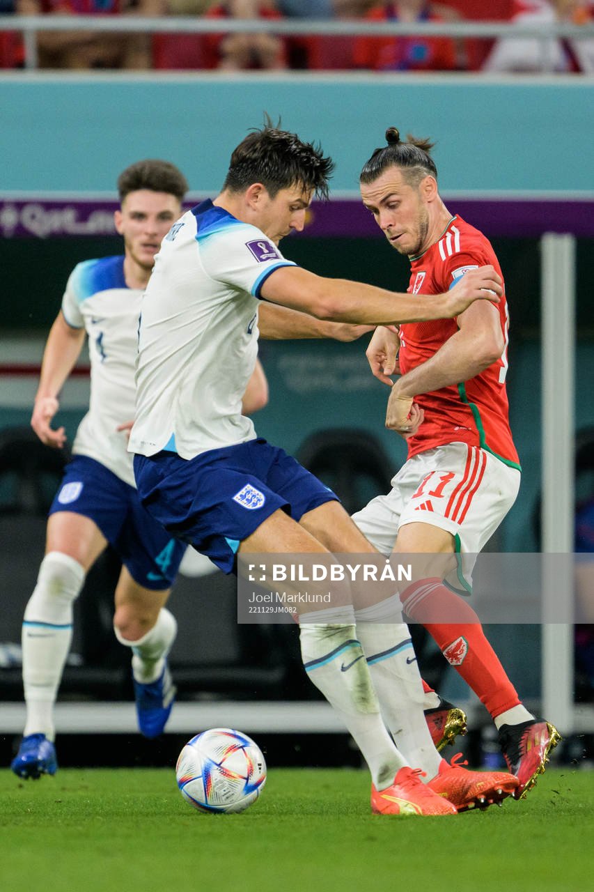 Harry Maguire of England and Gareth Bale of Wales