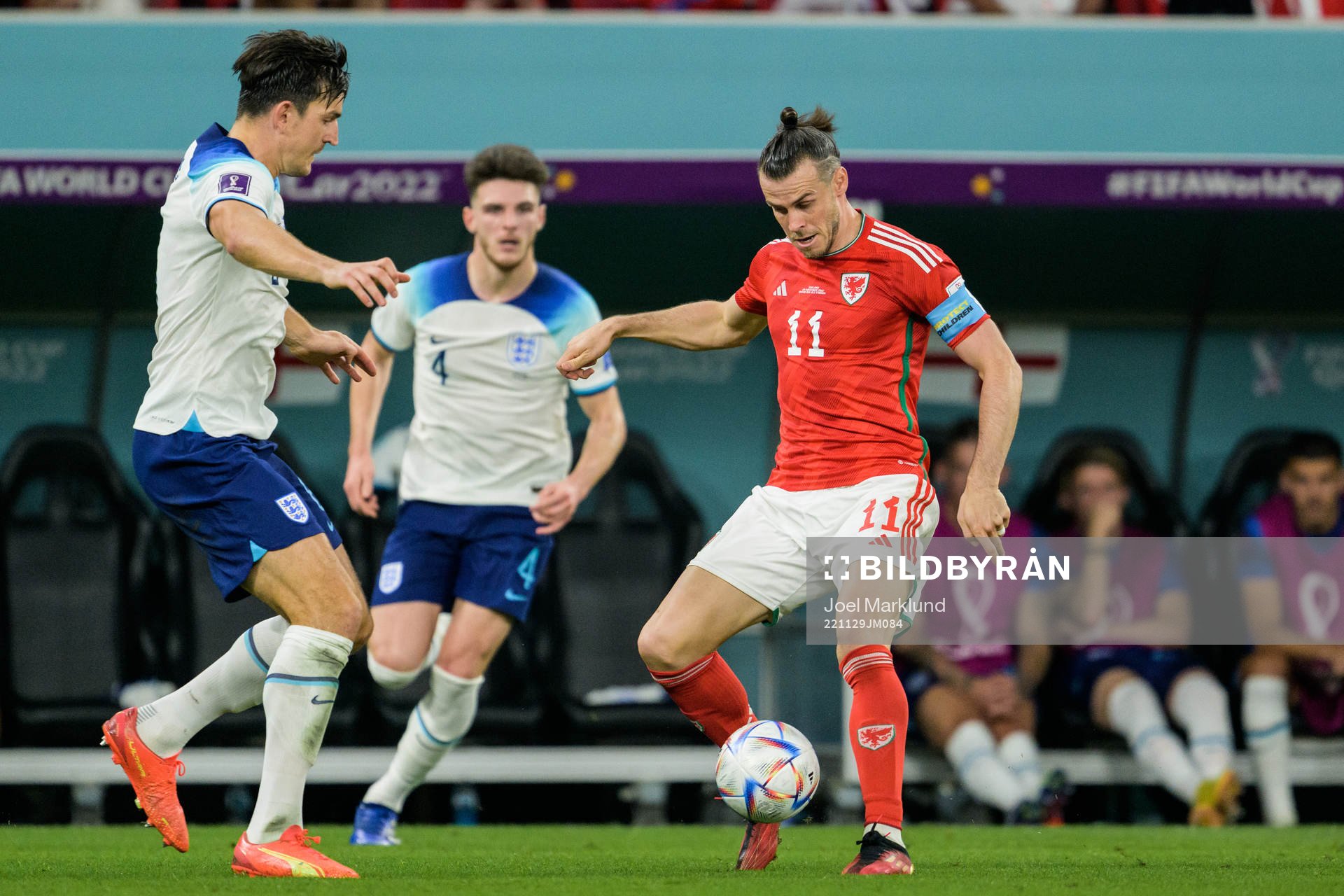 Harry Maguire of England and Gareth Bale of Wales