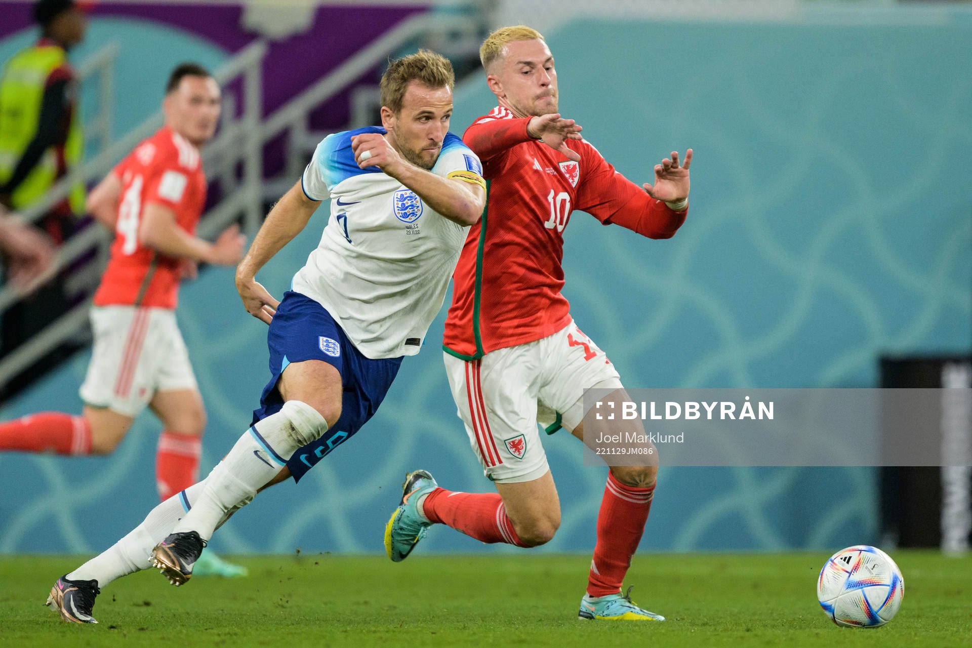 Harry Kane of England and Aaron Ramsey of Wales