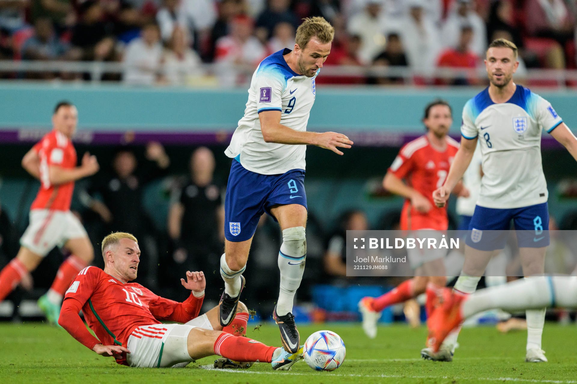 Aaron Ramsey of Wales and Harry Kane of England