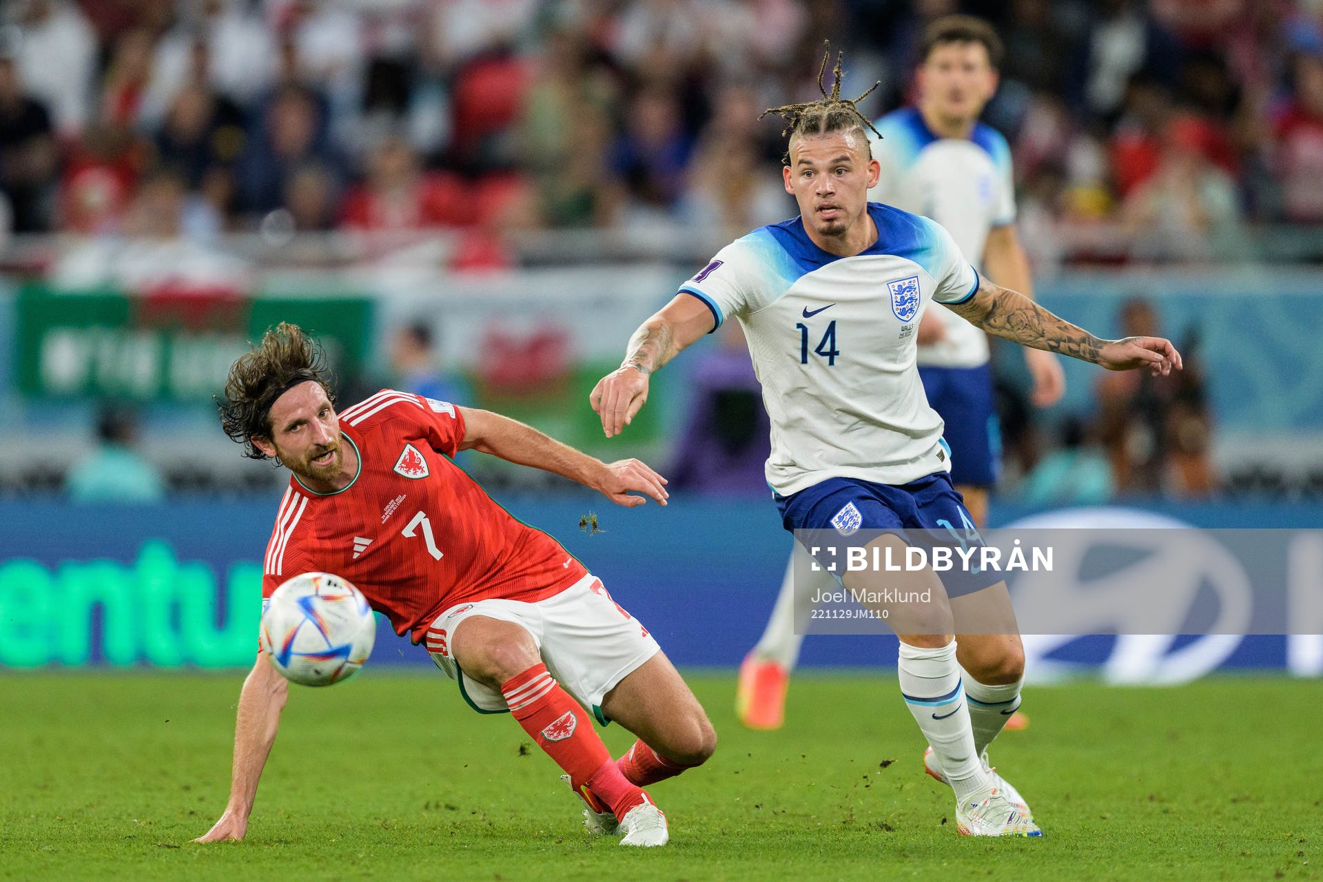 Joe Allen of Wales and Kalvin Phillips of England during the FIFA World Cup 2022 football match between Wales and England on November 29, 2022 in Doha.