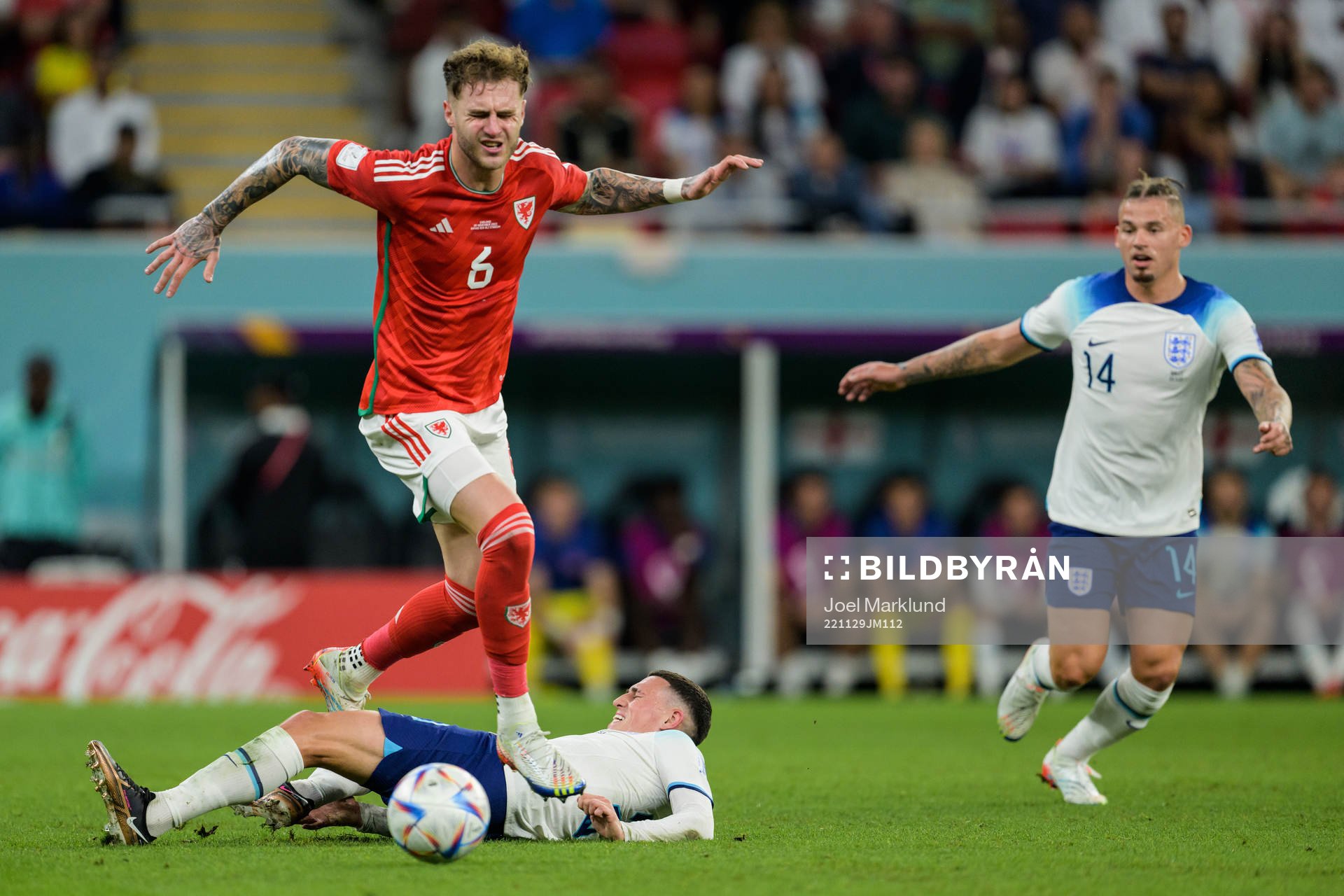 Joe Rodon of Wales and Phil Foden of England