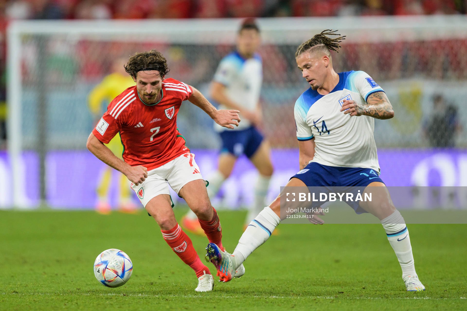 Joe Allen of Wales and Kalvin Phillips of England during the FIFA World Cup 2022 football match between Wales and England on November 29, 2022 in Doha.