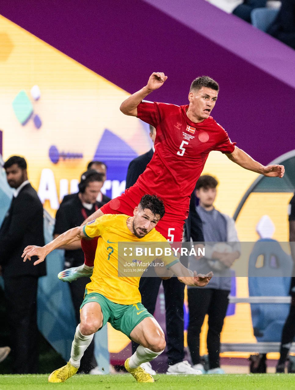 Joakim Mæhle of Denmark and Mathew Leckie of Australia